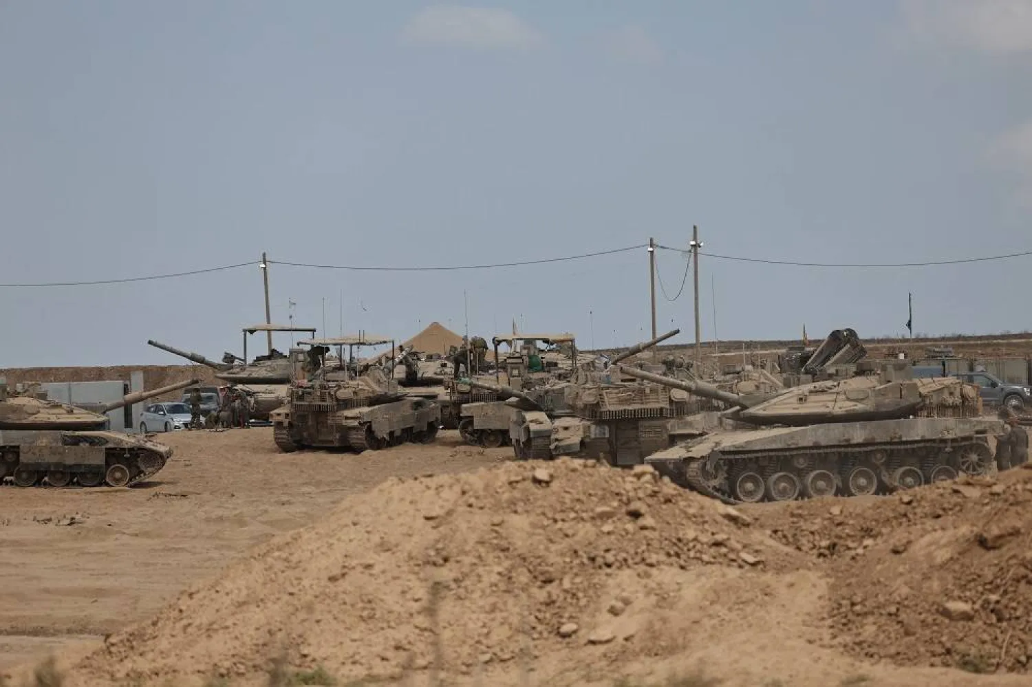 Israeli tanks and armored vehicles are deployed along the Israel-Gaza border in southern Israel, 16 September 2025. (EPA)