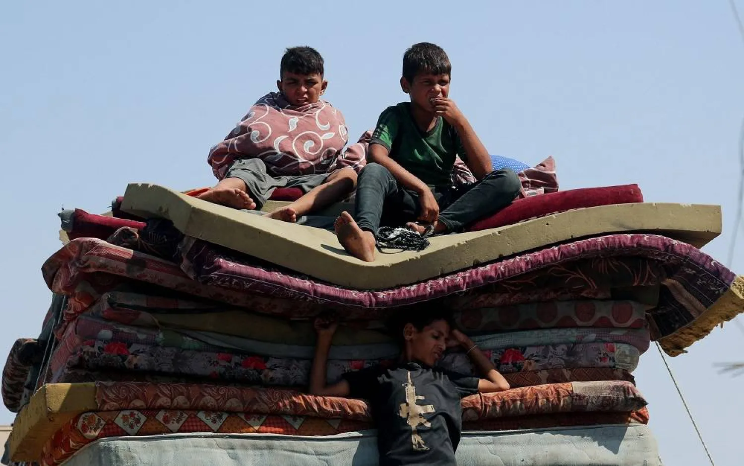 Displaced Palestinians, fleeing northern Gaza due to an Israeli military operation, move southward after Israeli forces ordered residents of Gaza City to evacuate to the south, in the central Gaza Strip September 16, 2025. (Reuters)