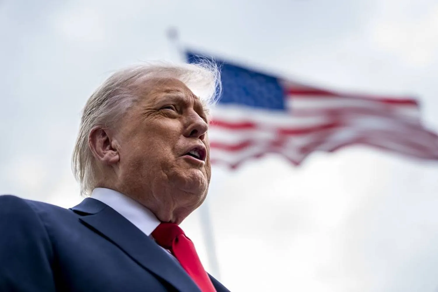 US President Donald Trump speaks to the press before boarding Marine One en route to the United Kingdom on the South Lawn of the White House in Washington, DC, USA, 16 September 2025. (EPA) 