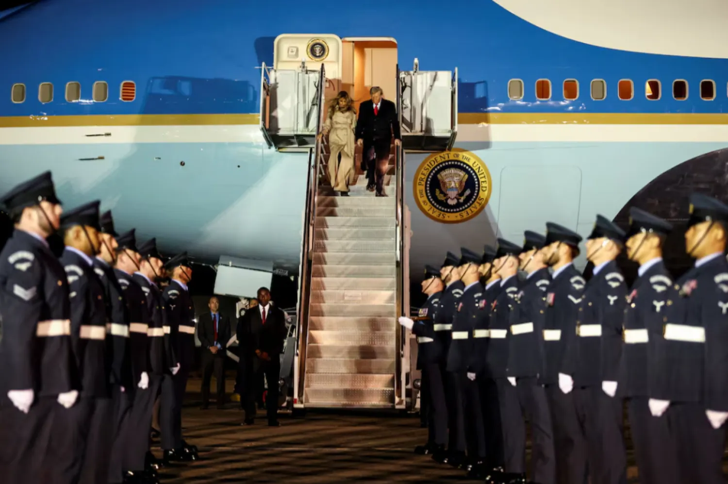 US President Donald Trump and first lady Melania Trump disembark Air Force One as they arrive for a state visit to Britain, at London Stansted Airport near London, Britain, September 16, 2025. REUTERS/Kevin Lamarque