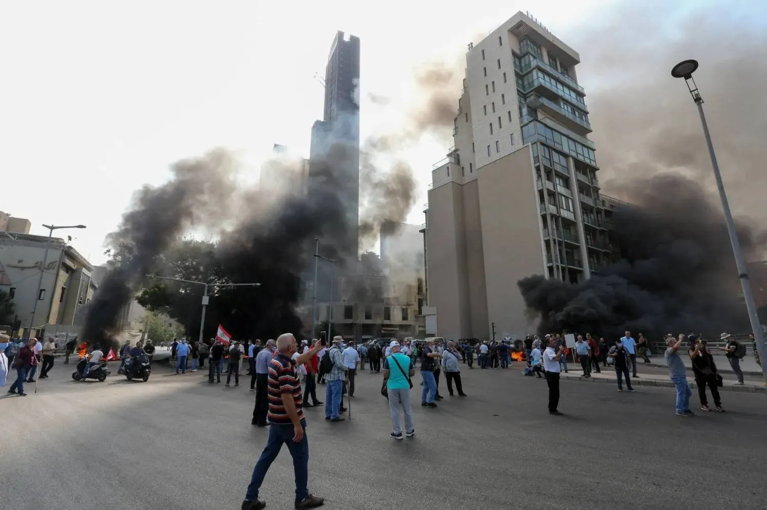 Retired members of the Lebanese security forces burn tires to block a road during a protest demanding inflation adjustments to their pensions, in downtown Beirut, Lebanon, 17 September 2025. EPA/WAEL HAMZEH