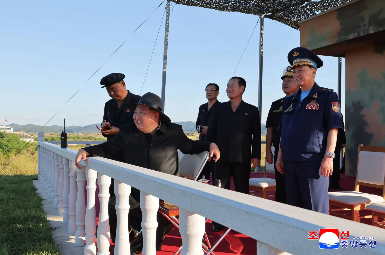 This picture taken on September 18, 2025 and released from North Korea's official Korean Central News Agency (KCNA) via KNS on September 19, 2025 shows North Korea's leader Kim Jong Un (front L) leading the performance test of an unmanned strategic reconnaissance aircraft at an undisclosed location in North Korea. (Photo by KCNA VIA KNS / AFP)