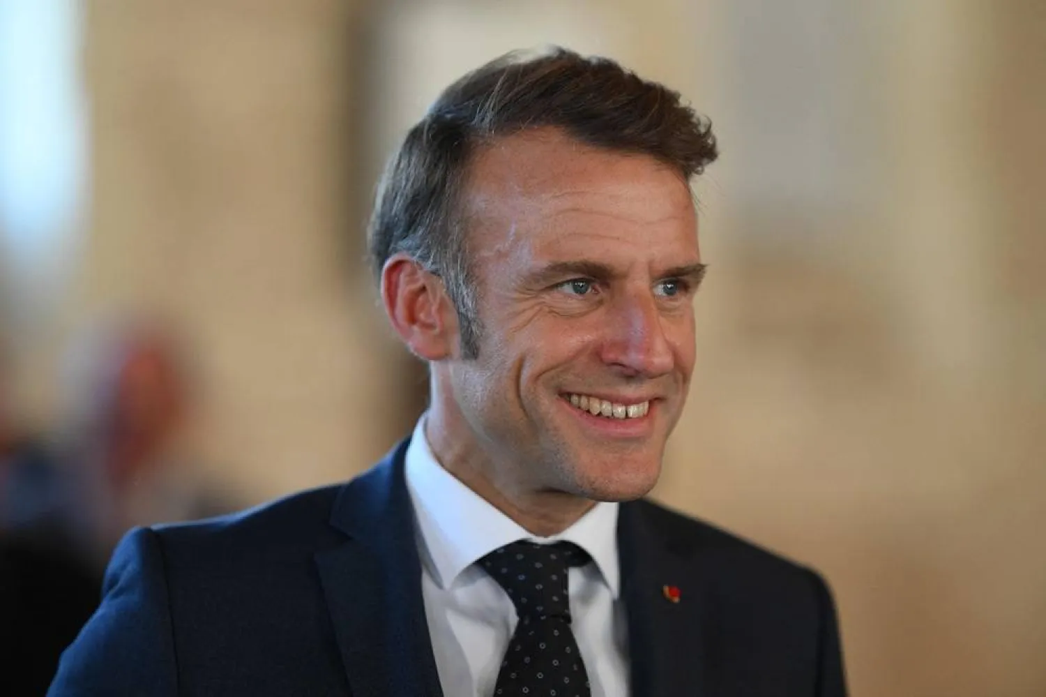  France's President Emmanuel Macron looks on during a visit to the Benedictine abbey of Pontlevoy, as part of the 42nd edition of the European Heritage Days, in Pontlevoy central France, on September 19, 2025. (AFP)
