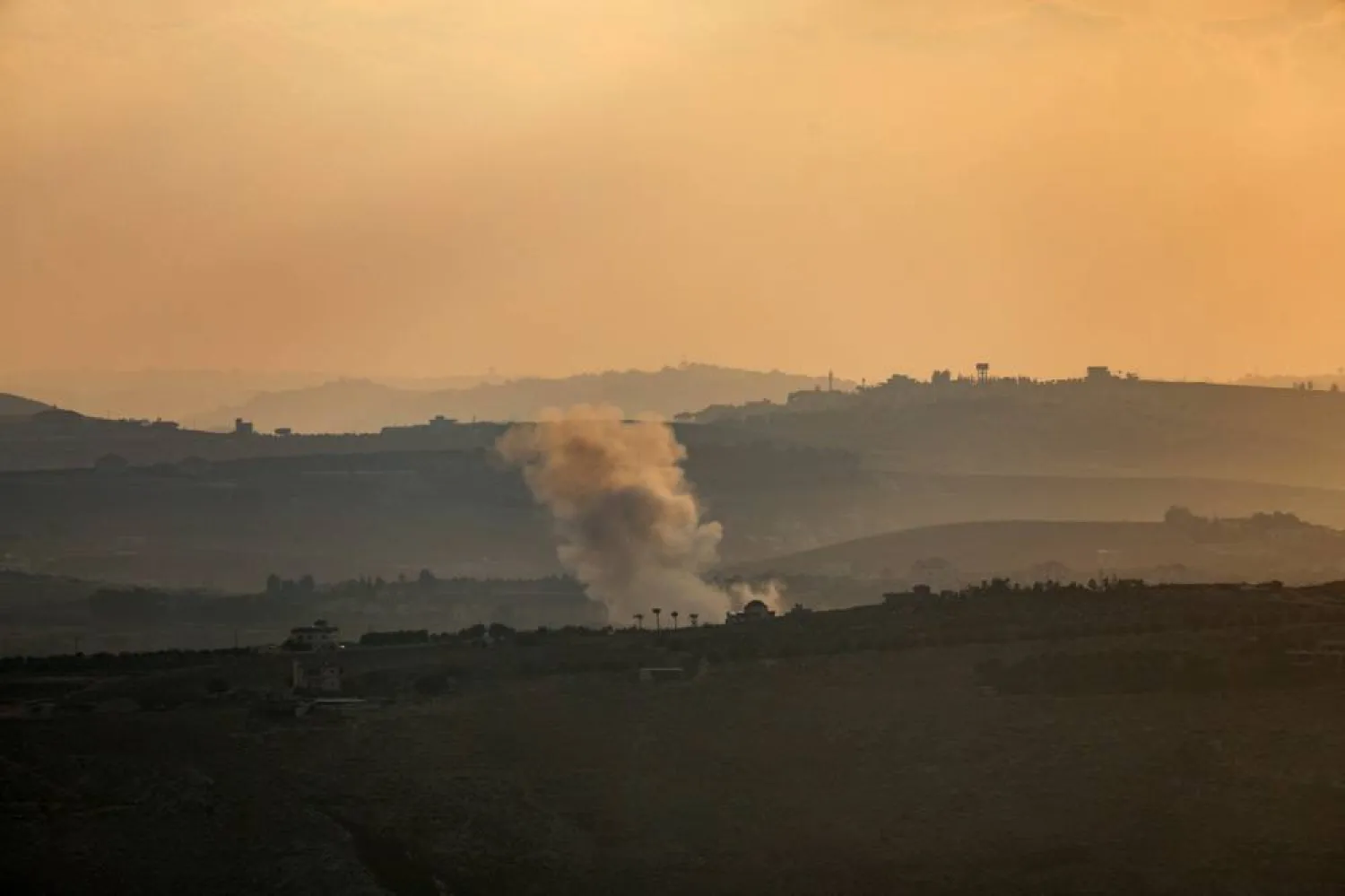  Smoke billows over Kfar Tebnit after an Israeli strike near Lebanon’s border with Israel, as seen from Marjeyoun, Lebanon, September 18, 2025. (Reuters)