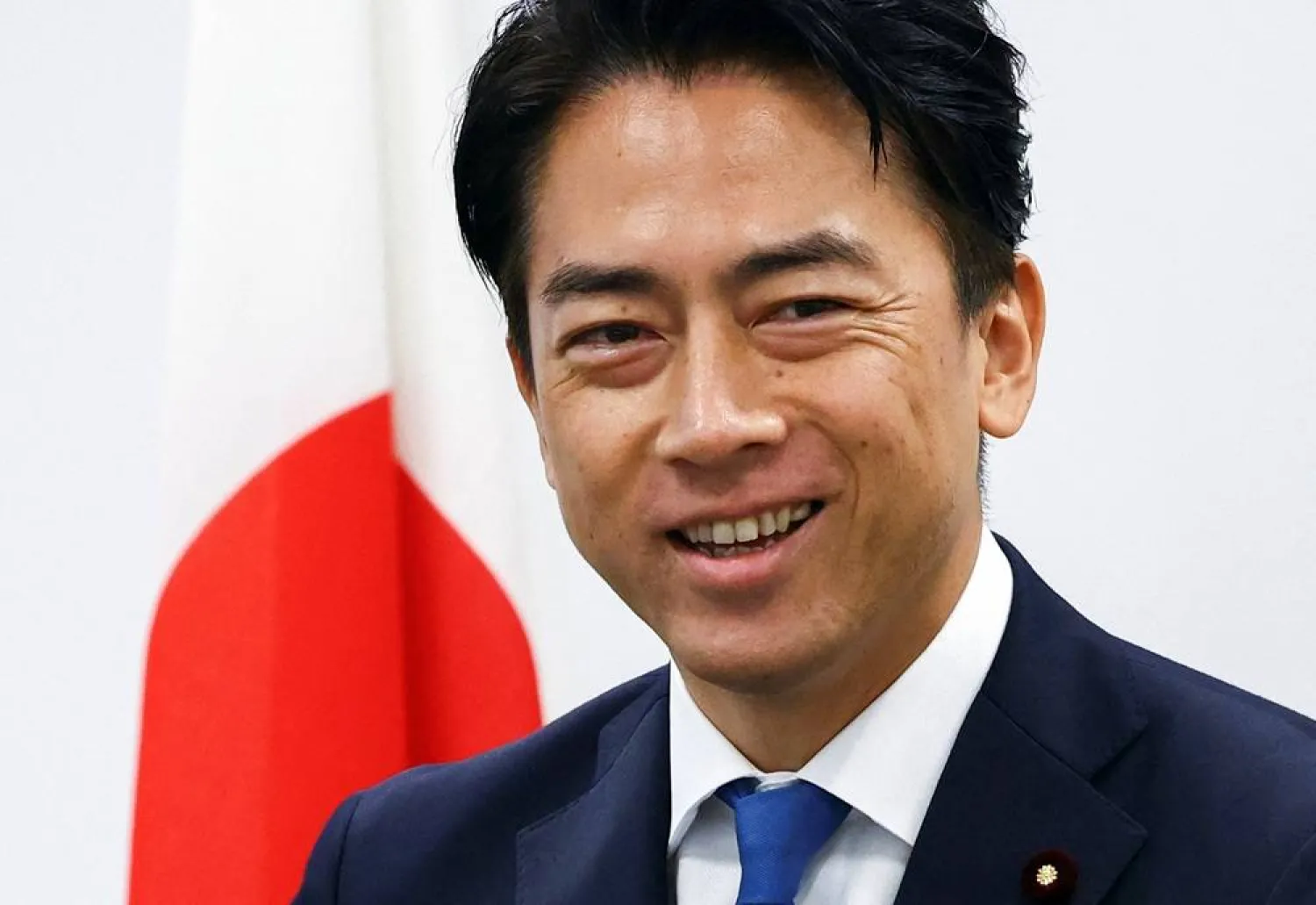 Japan's Prime Minister contender Shinjiro Koizumi, who is currently Agriculture Minister and son of the former Prime Minister Junichiro Koizumi, smiles as he attends a press conference about his running in the ruling Liberal Democratic Party leadership race in Tokyo, Japan, September 20, 2025. (Reuters)