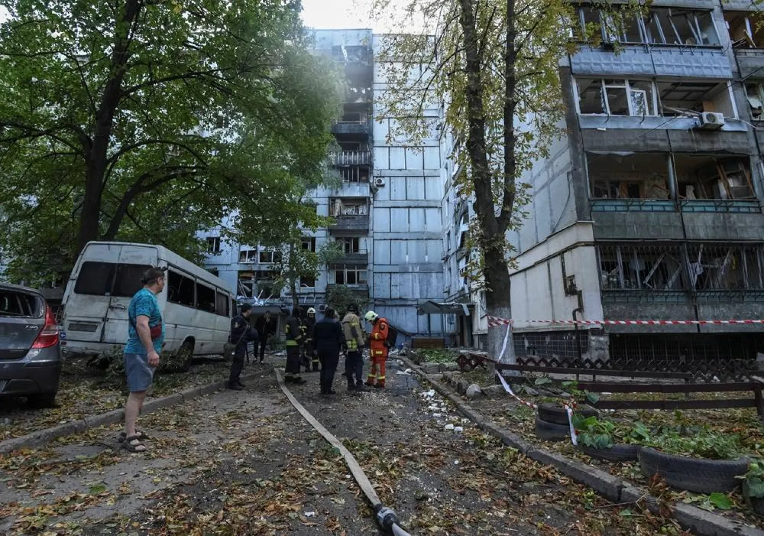  Firefighters work at the site of apartment buildings hit during a Russian missile strike, amid Russia's attack on Ukraine, in Dnipro, Ukraine September 20, 2025. (Reuters)