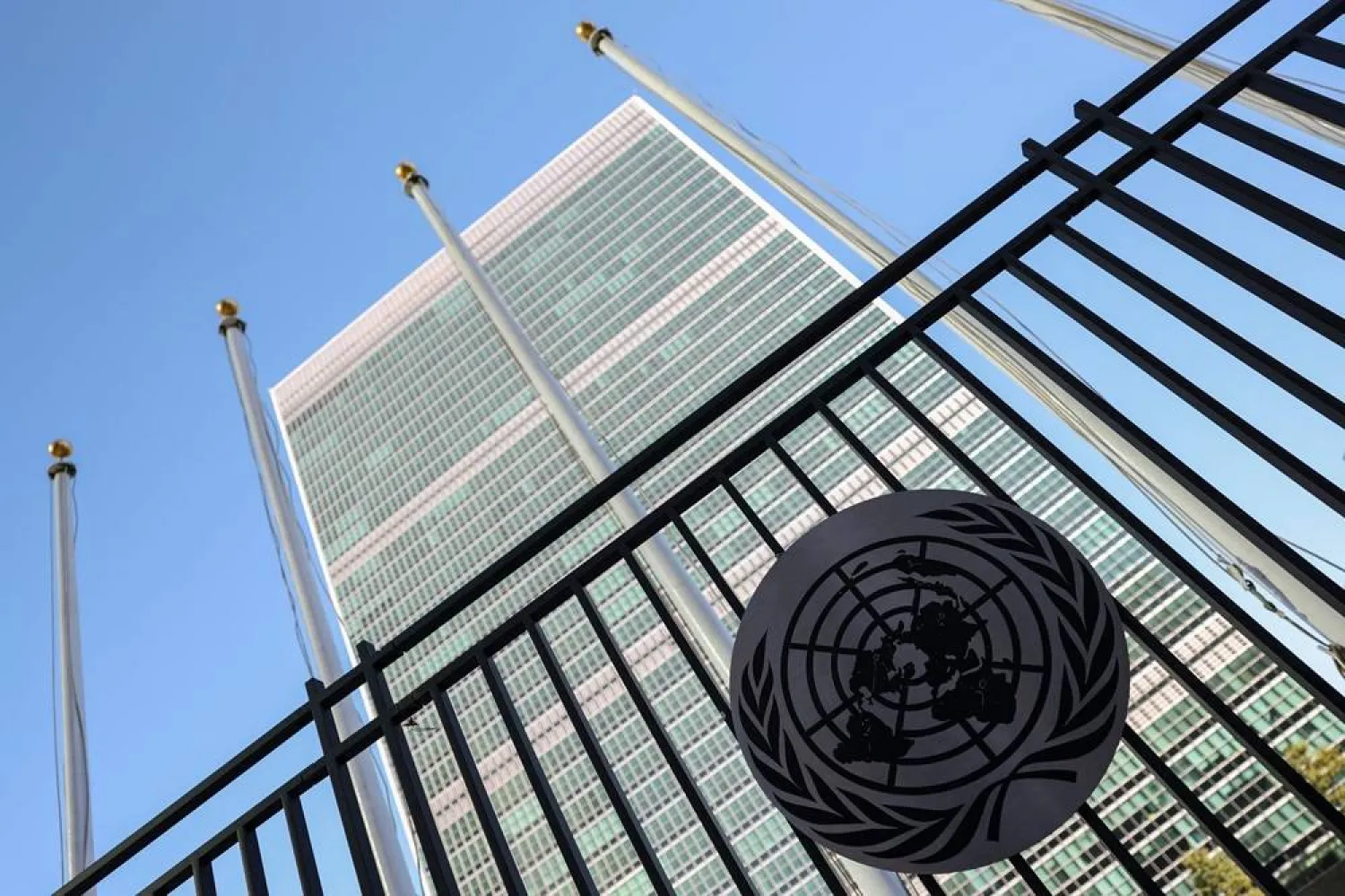  The United Nations logo is seen on a fence outside UN Headquarters on September 18, 2025 in New York City. (AFP)