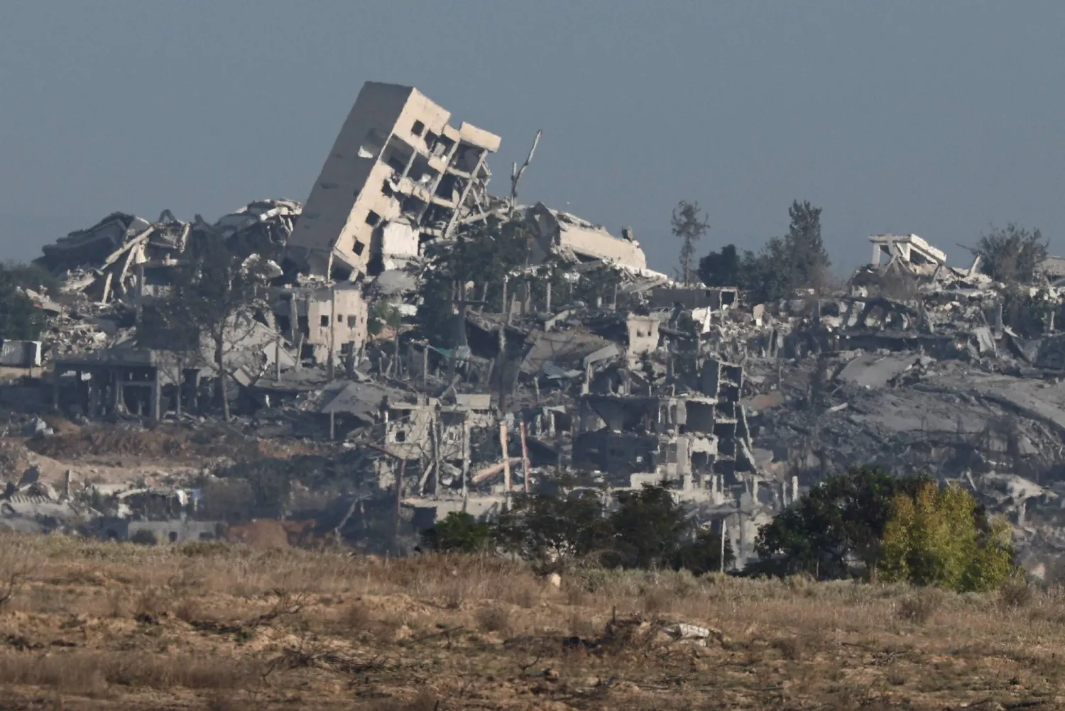 Destroyed buildings in Gaza, as seen from Israeli side of the Israel-Gaza border, in Israel, September 21, 2025. REUTERS/Amir Cohen