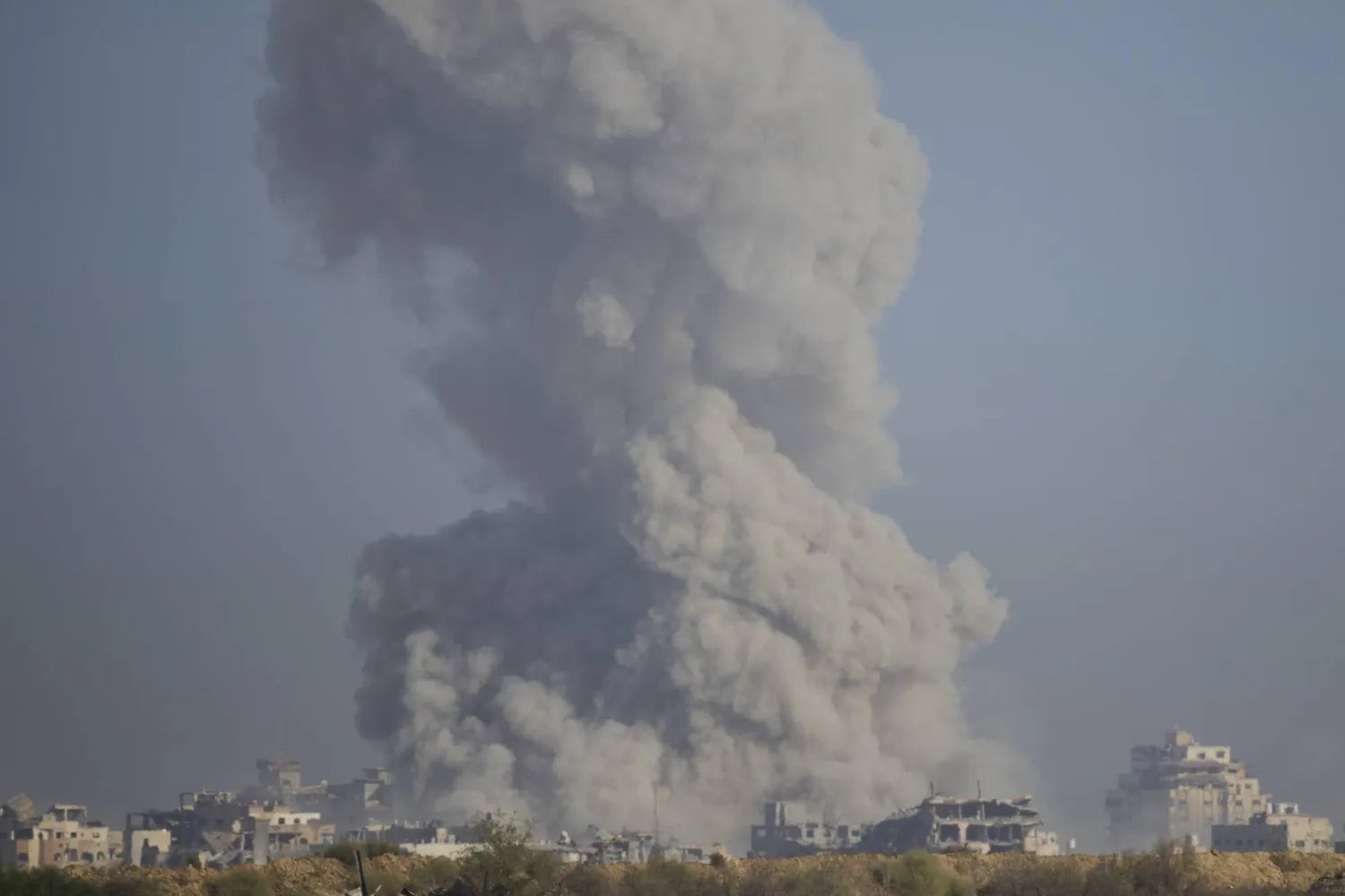 Smoke rises following an explosion in the Gaza Strip, as seen from southern Israel, Sunday, Sept. 21, 2025. (AP Photo/Ohad Zwigenberg)