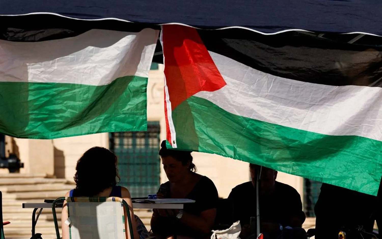 Activists hold a two-day protest vigil in solidarity with the victims in Gaza outside the Auberge de Castille, the office of Malta's Prime Minister Robert Abela after he announced that Malta will formally recognize the State of Palestine in the coming days, amid the ongoing conflict between Israel and Hamas, in Valletta, Malta, September 21, 2025. (Reuters)