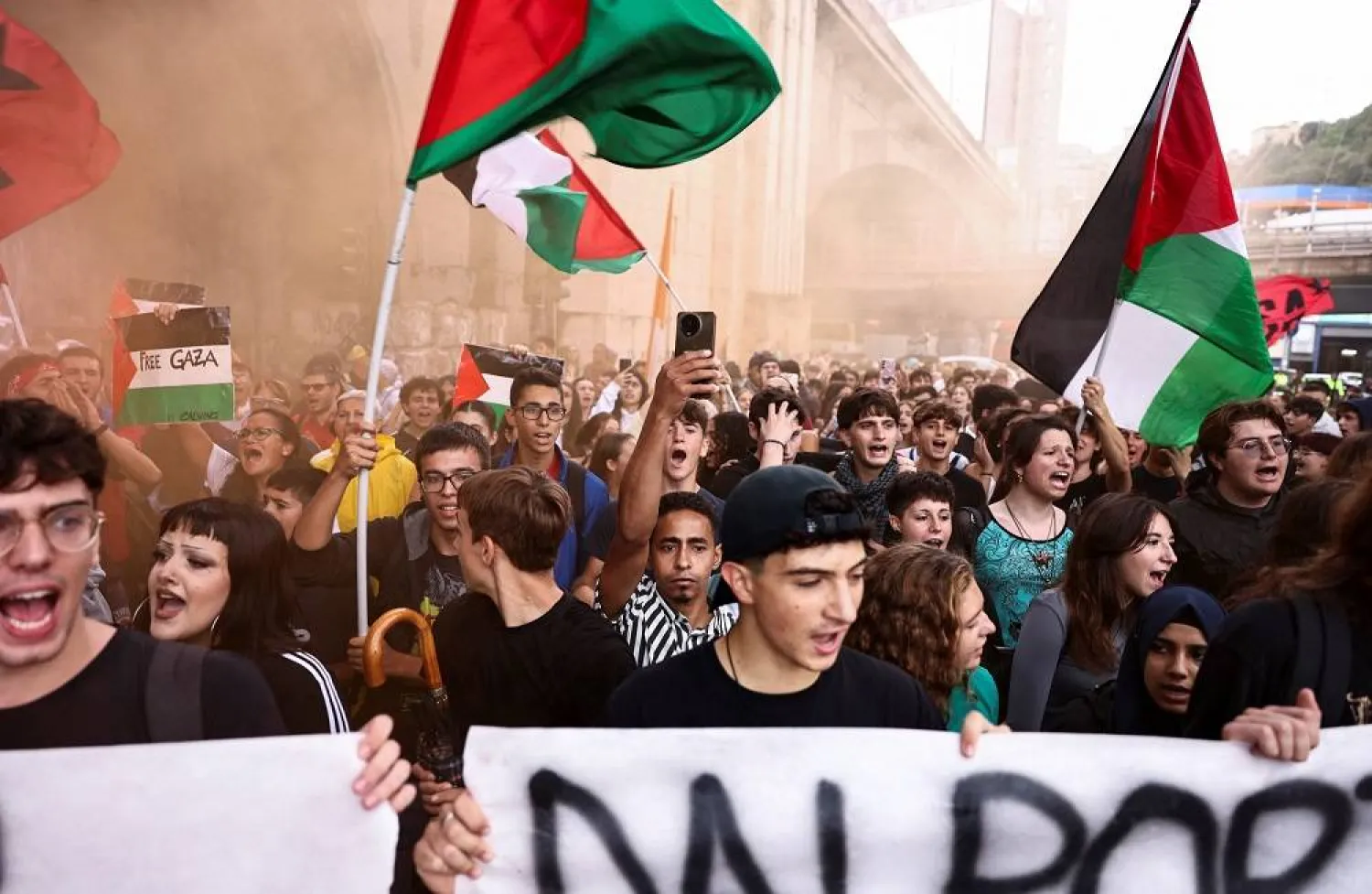 Students gather for a demonstration, as dockworkers take part in a strike near the port of Genoa as part of a nationwide "Let's Block Everything" protest, with activists calling for a halt to arms shipments to Israel, in Genoa, Italy, September 22, 2025. (Reuters) 