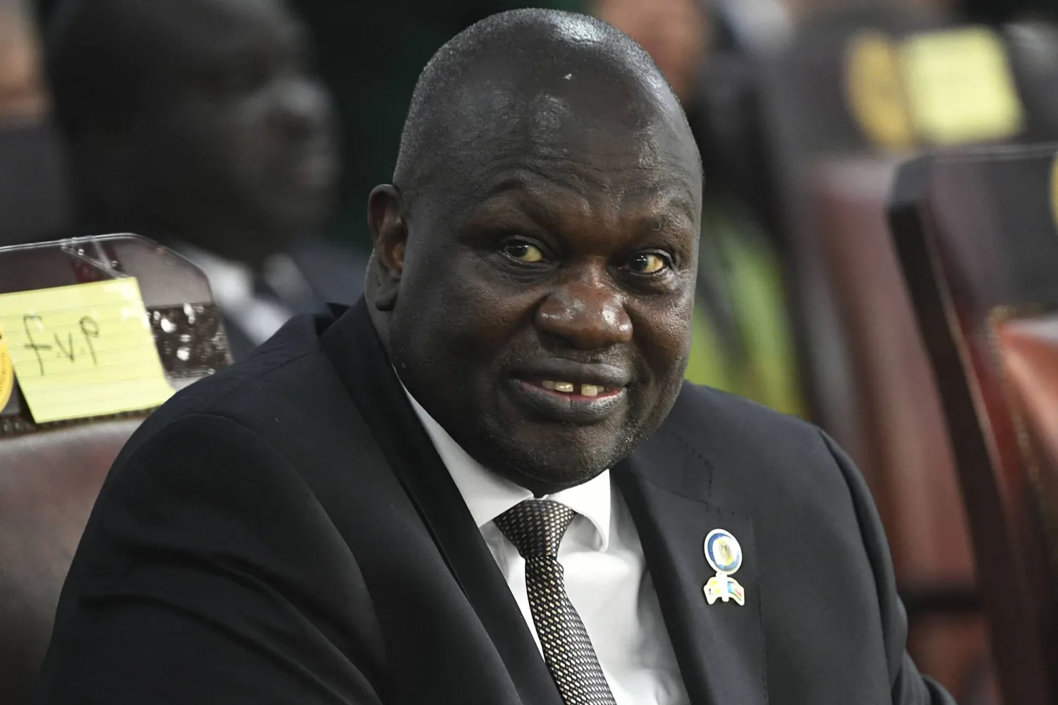 (FILES) South Sudan's Vice President Riek Machar attends a meeting of Pope Francis with authorities, leaders of civil society and the diplomatic corps, in the garden of the Presidential Palace in Juba, February 3, 2023. (Photo by Simon MAINA / AFP)