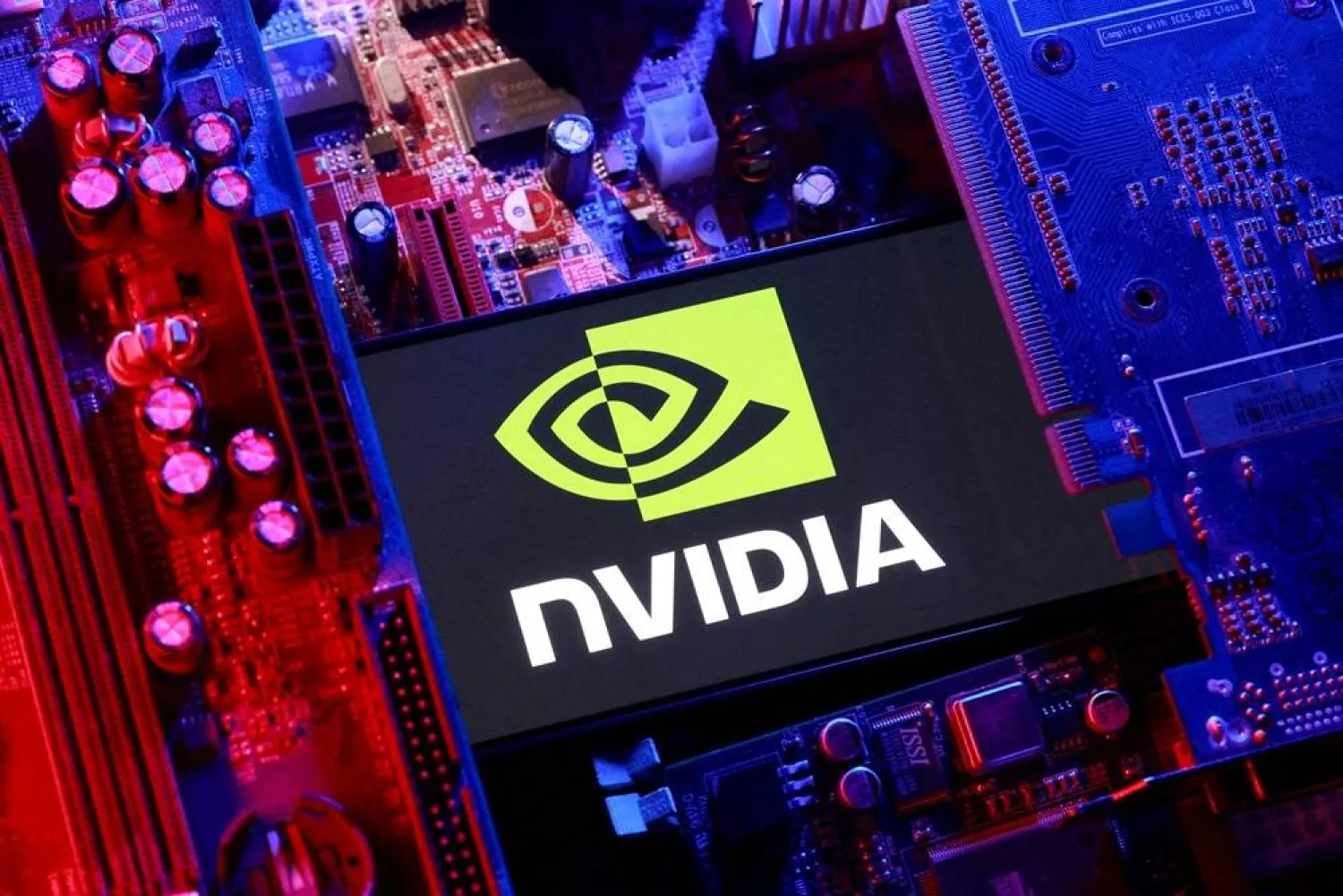 A Nvidia logo and a computer motherboard appear in this illustration taken August 25, 2025. (Reuters)