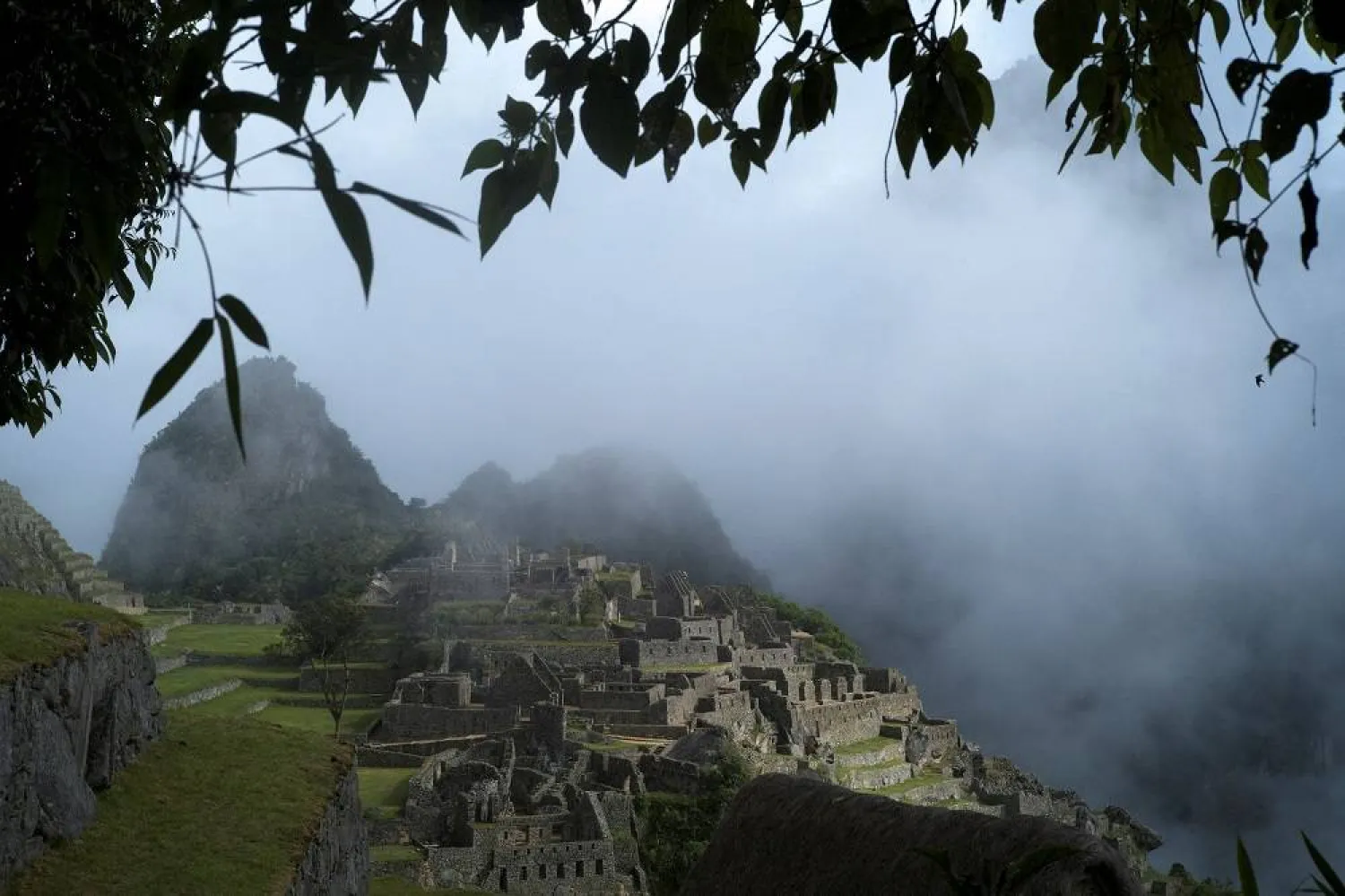 Fog is seen around the Incan ruins of Machu Picchu, a tourism magnet, outside Cuzco, Peru, April 18, 2022. (Reuters)