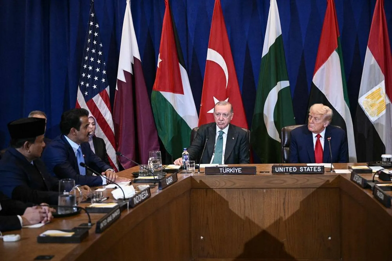 At table, L/R, Indonesia's President Prabowo Subianto, Qatar's Emir Sheikh Tamim bin Hamad Al Thani, Türkiye's President Recep Tayyip Erdogan, and US President Donald Trump attend a multilateral meeting to discuss the situation in Gaza, on the sidelines of the United Nations General Assembly in New York City on September 23, 2025. (AFP) 