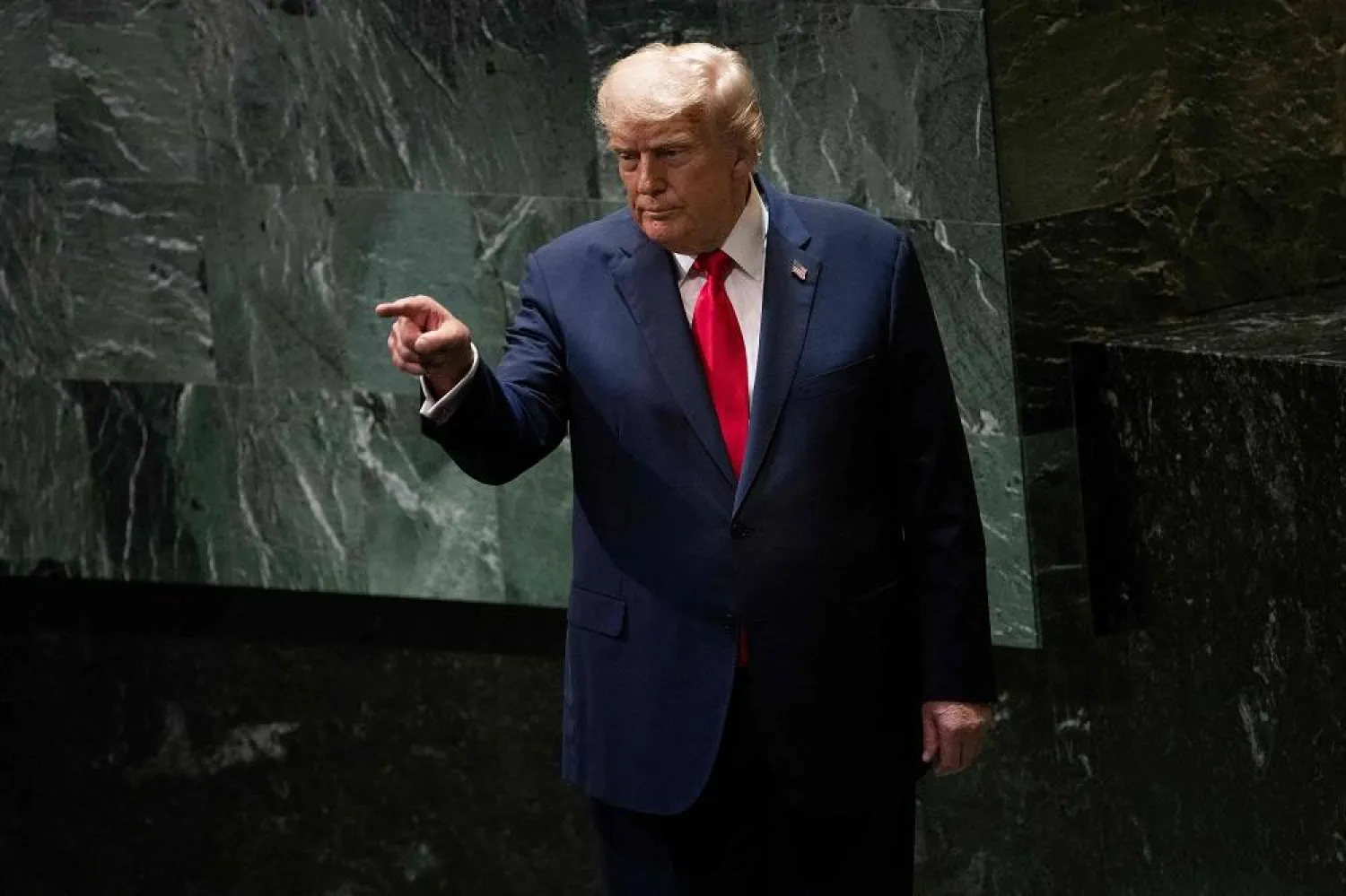 US President Donald Trump points to attendees after delivering remarks to the United Nations General Assembly at the UN headquarters in New York City on September 23, 2025. (AFP) 