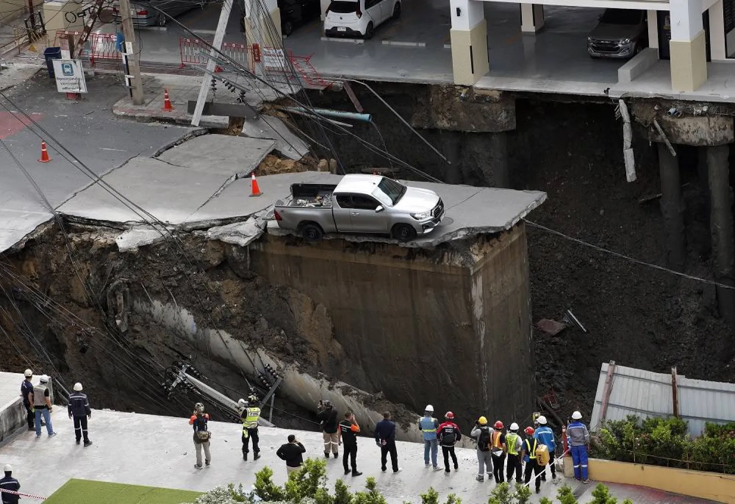 Bangkok Road Collapse Creates Sinkhole, Disrupting Traffic and