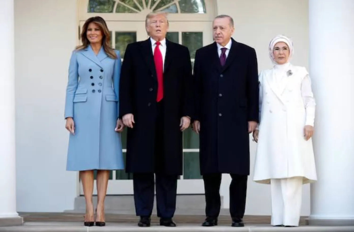 US President Donald Trump and first lady Melania Trump stand with Türkiye's Pressident Tayyip Erdogan and Emine Erdogan at the White House in Washington, US, November 13, 2019. REUTERS/Tom Brenner/File Photo Purchase Licensing Rights