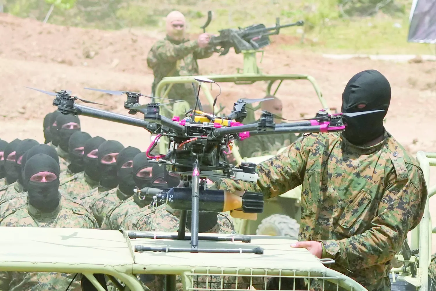 Hezbollah fighters during a military drill in southern Lebanon, May 2023 (File photo – AP).  
