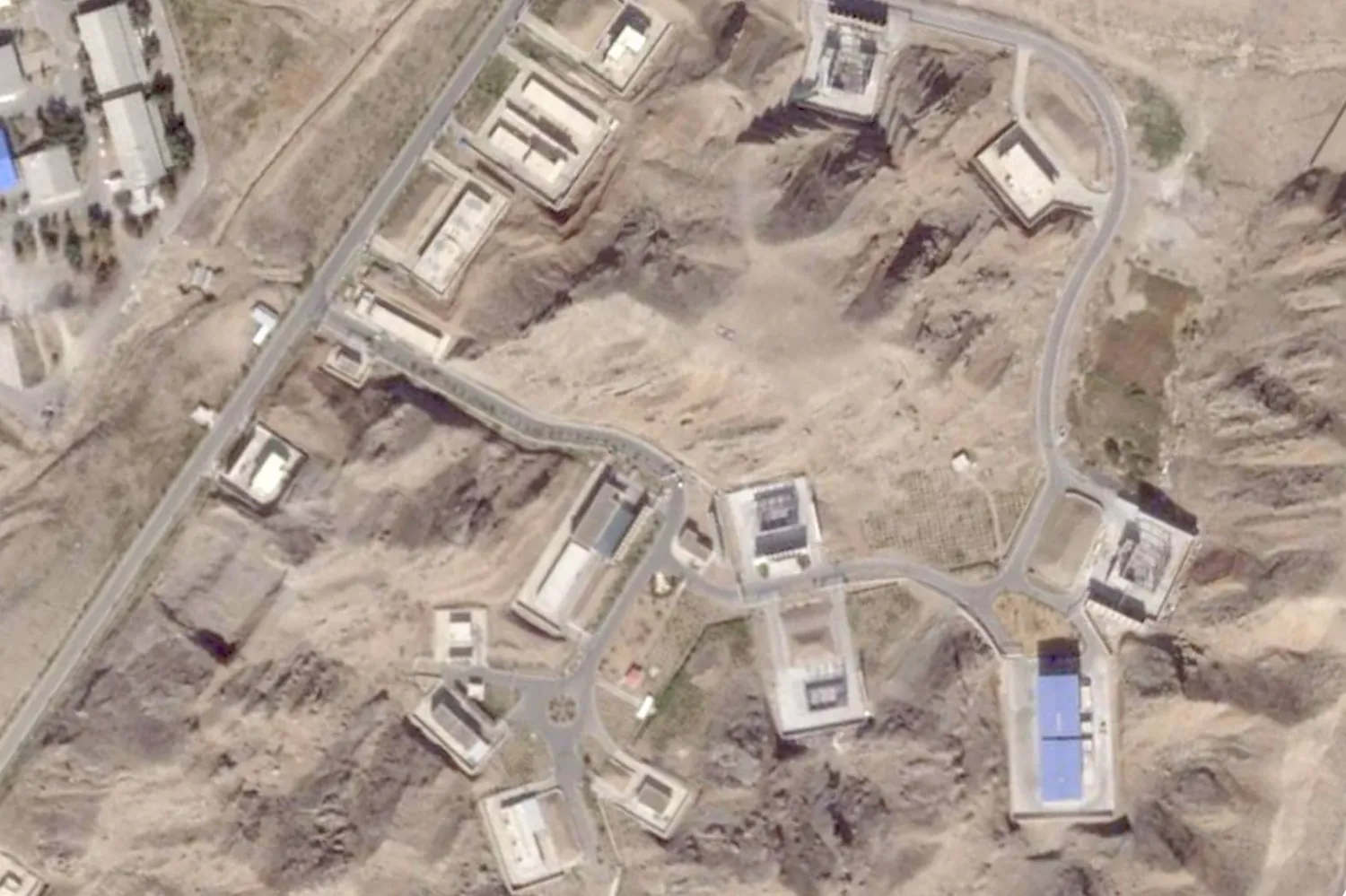 This satellite photo from Planet Labs PBC shows reconstruction efforts at Iran's Parchin solid propellant plant outside of Tehran, Iran, Aug. 28, 2025. (Planet Labs PBC via AP)