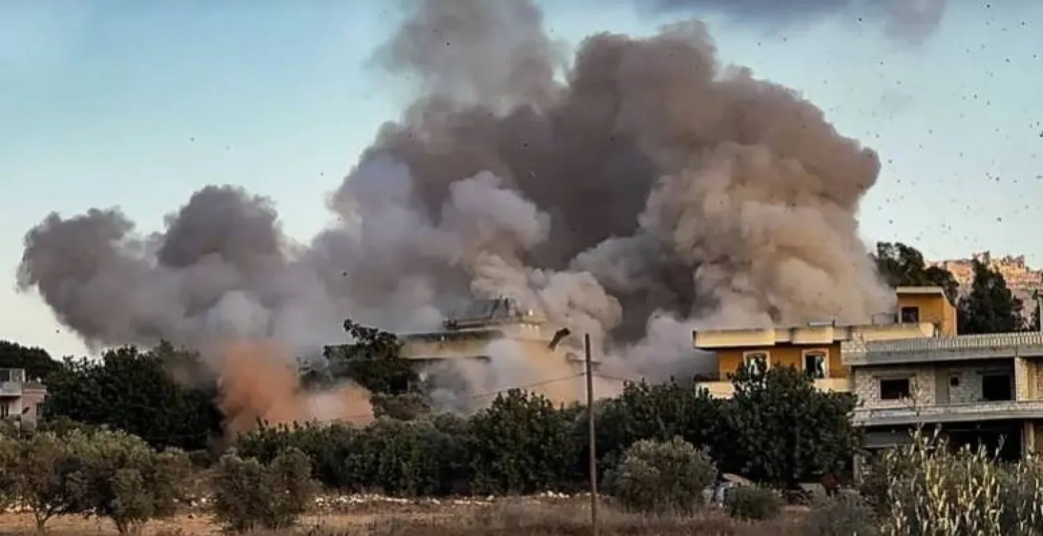 Smoke billows over Kfar Tebnit after an Israeli strike near Lebanon’s border with Israel, in Lebanon, September 18, 2025. (Reuters)
