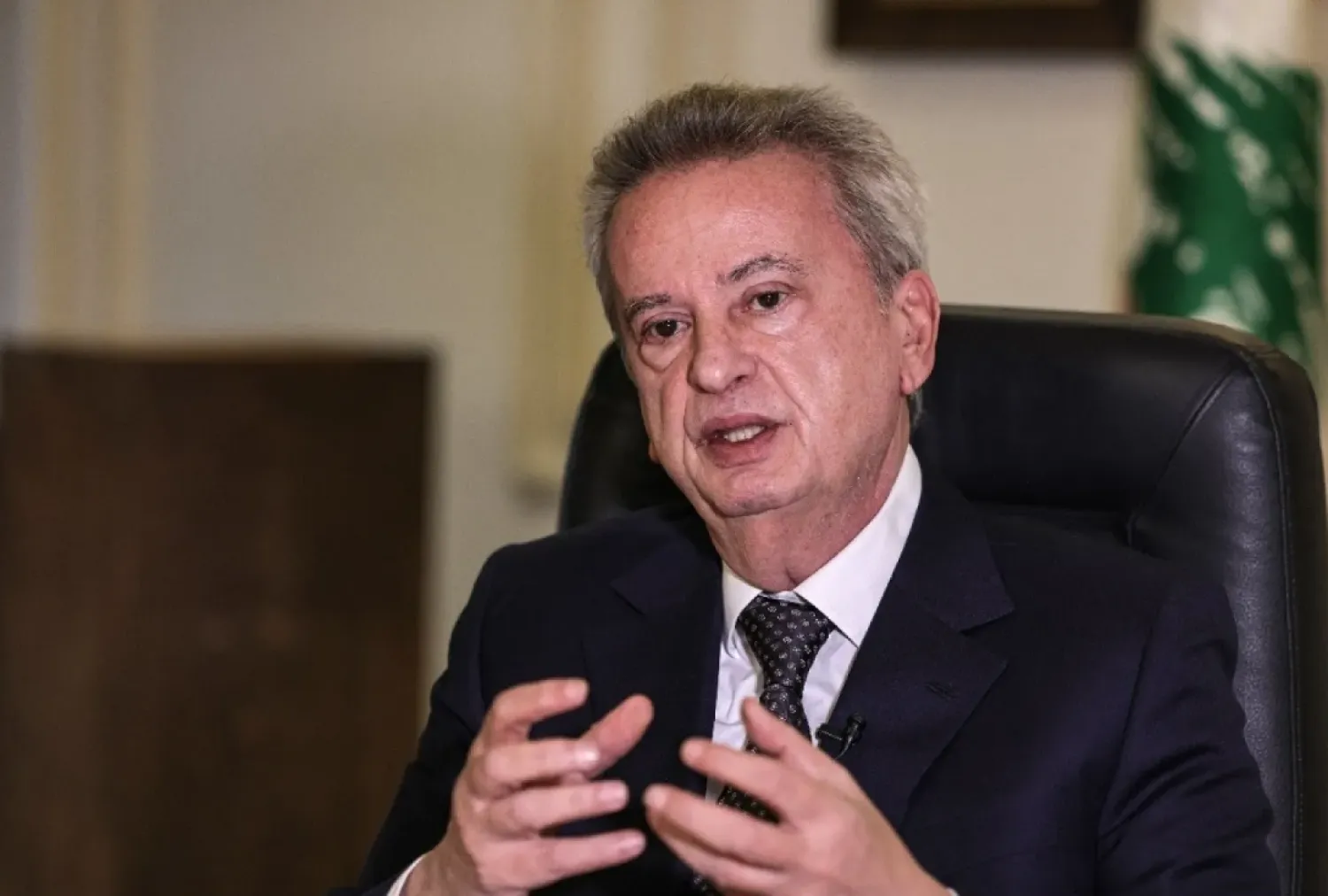 Lebanon's Central Bank Governor Riad Salameh speaks with AFP in an interview at his Beirut office. (AFP)

