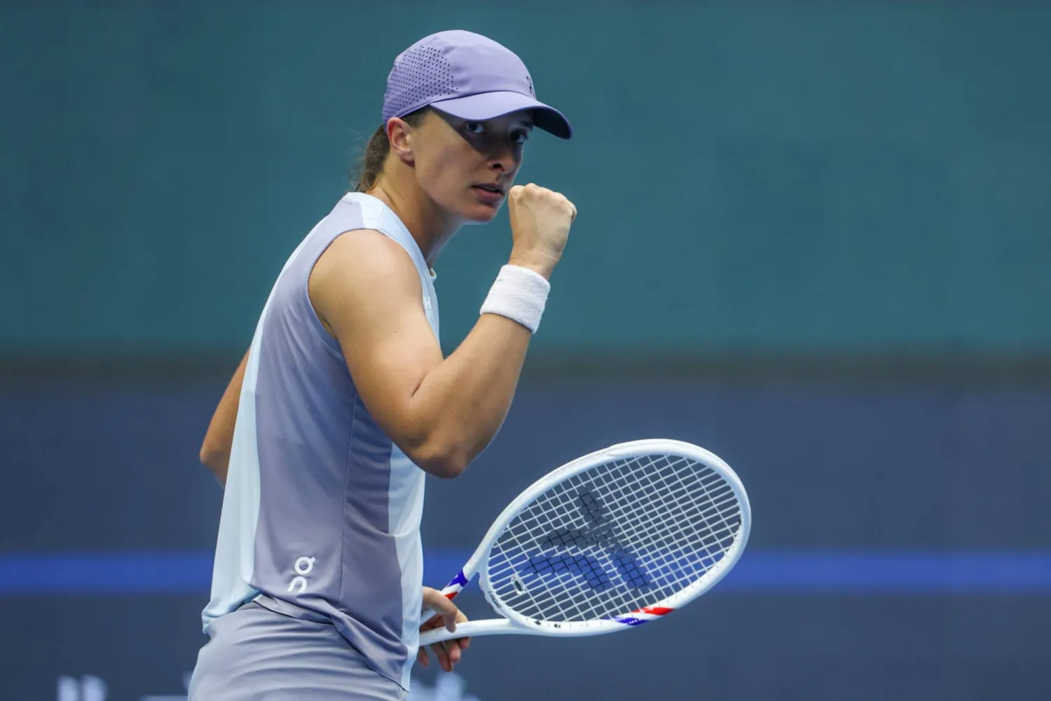 Iga Swiatek of Poland gestures during the women's singles round of 64 match against Yuan Yue of China in the China Open tennis tournament in Beijing, China, 27 September 2025.  EPA/WU HAO
