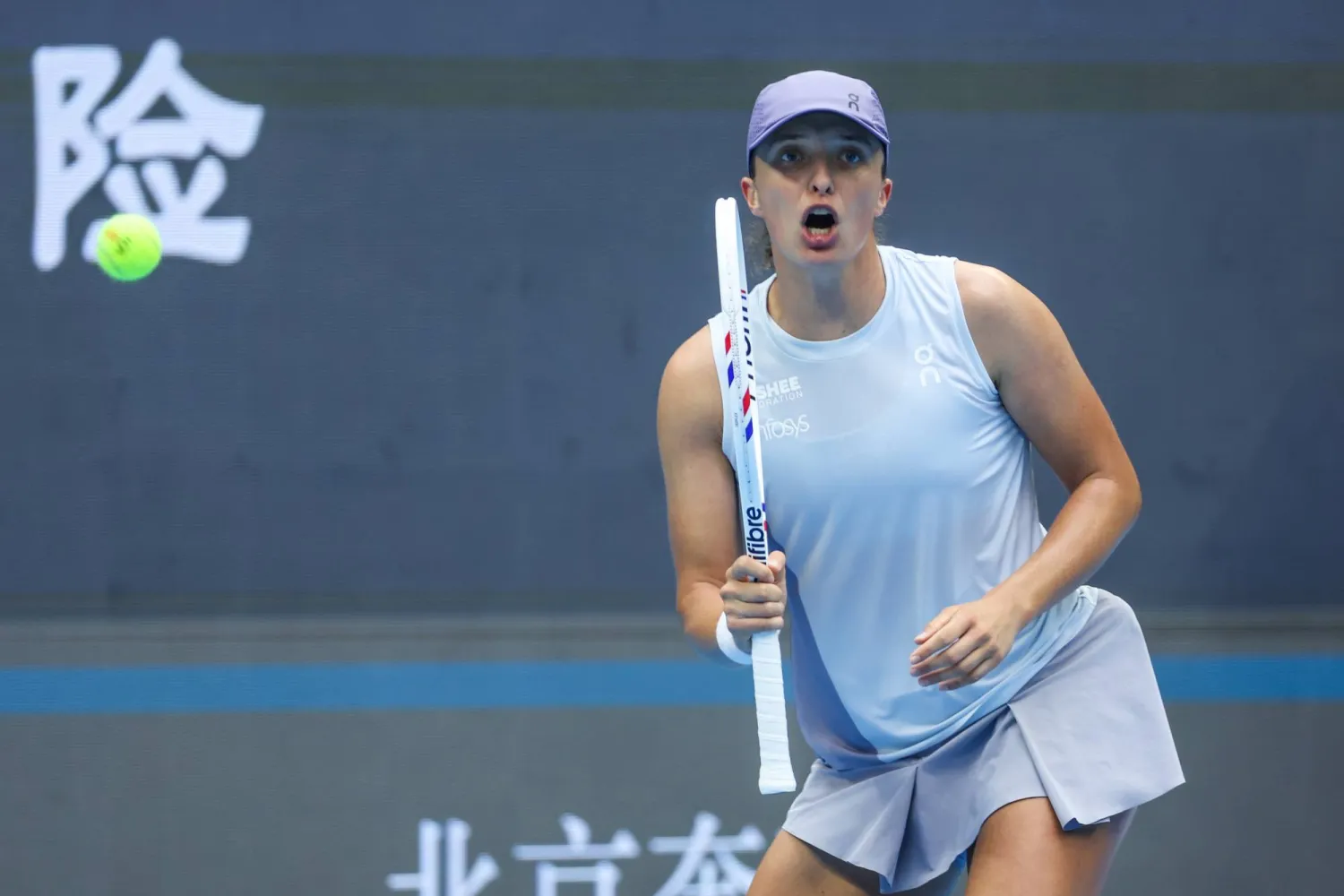 البولندية إيغا شفيونتيك تتقدم في بكين (إ.ب.أ)