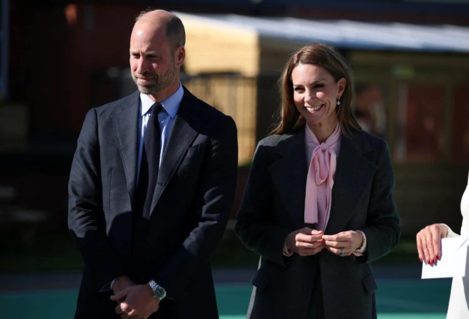Britain’s Prince William, left, and Kate, Princess of Wales visit Churchtown Primary School, Southport, England, Tuesday Sept. 23, 2025. (Phil Noble/Pool Photo via AP)

