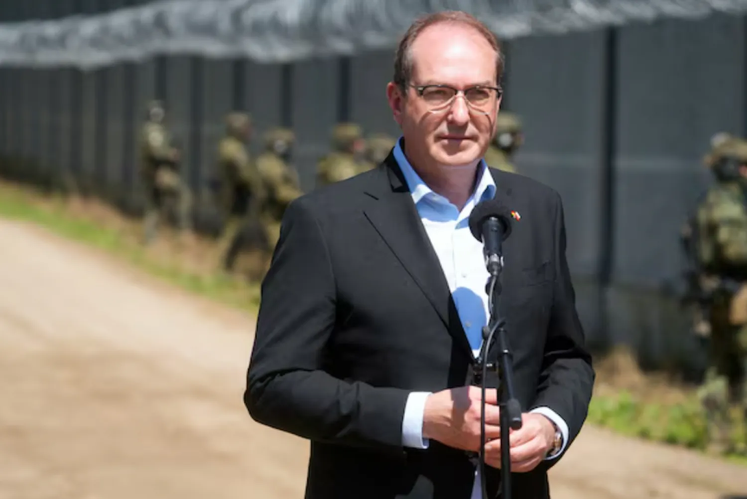 German Interior Minister Alexander Dobrindt attends a press conference a during a visit to the Polish-Belarusian border crossing Polowce-Pyaschatka, Poland July 21, 2025. REUTERS/Ints Kalnins/File Photo 
