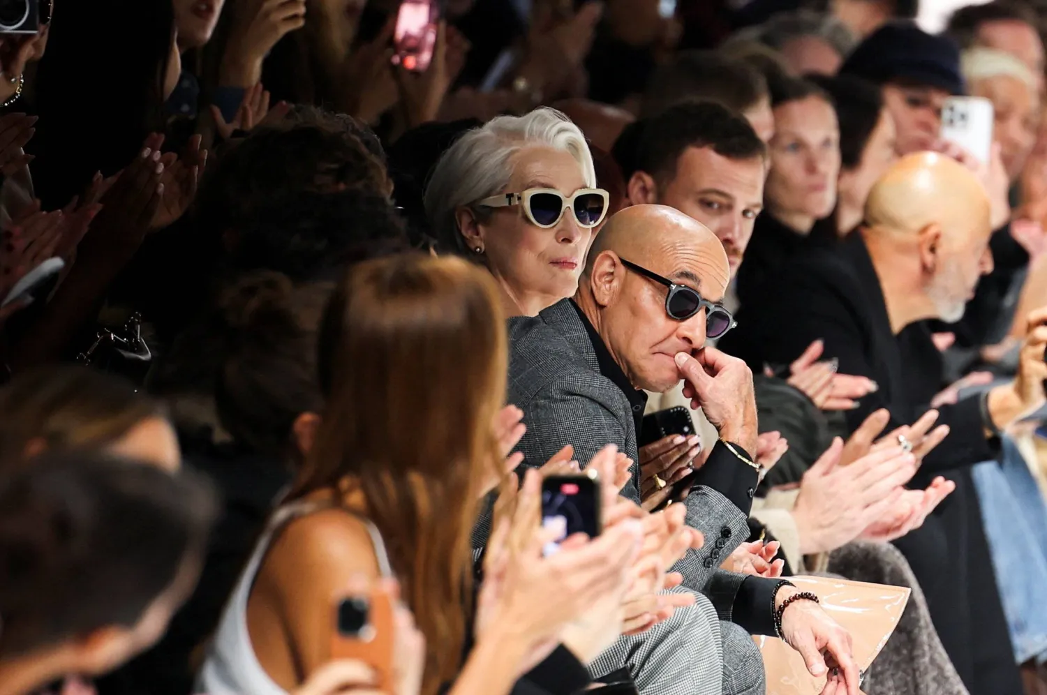 Meryl Streep and Stanley Tucci look on at the end of the Dolce & Gabbana spring/summer 2026 collection show during Fashion Week in Milan, Italy, September 27, 2025. REUTERS/Claudia Greco