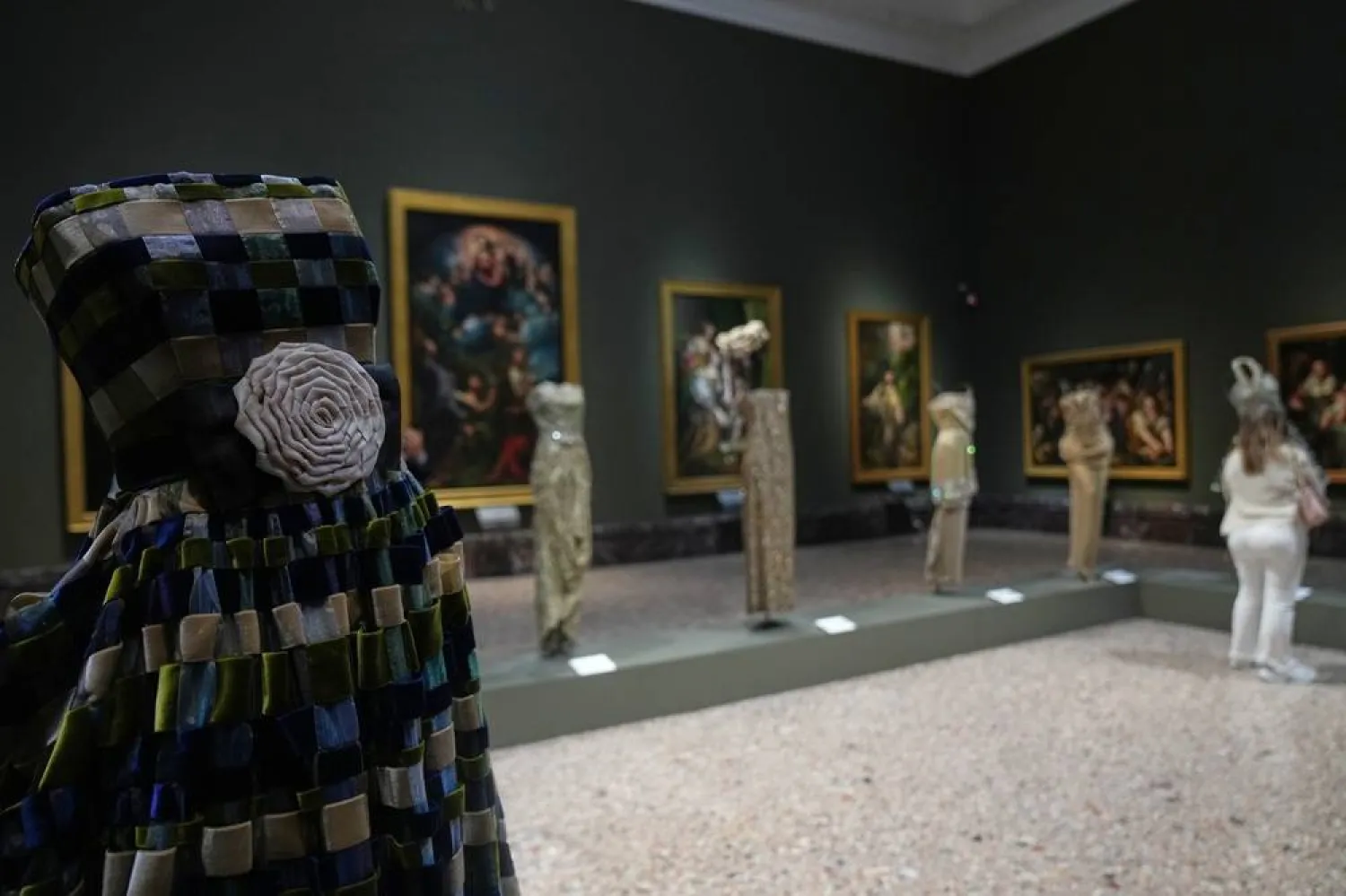  Giorgio Armani's creations are displayed during the exhibition "Giorgio Armani - 50 Years" opened to the public at the Pinacoteca di Brera in Milan, Italy, Wednesday, Sept. 24 2025. (AP)