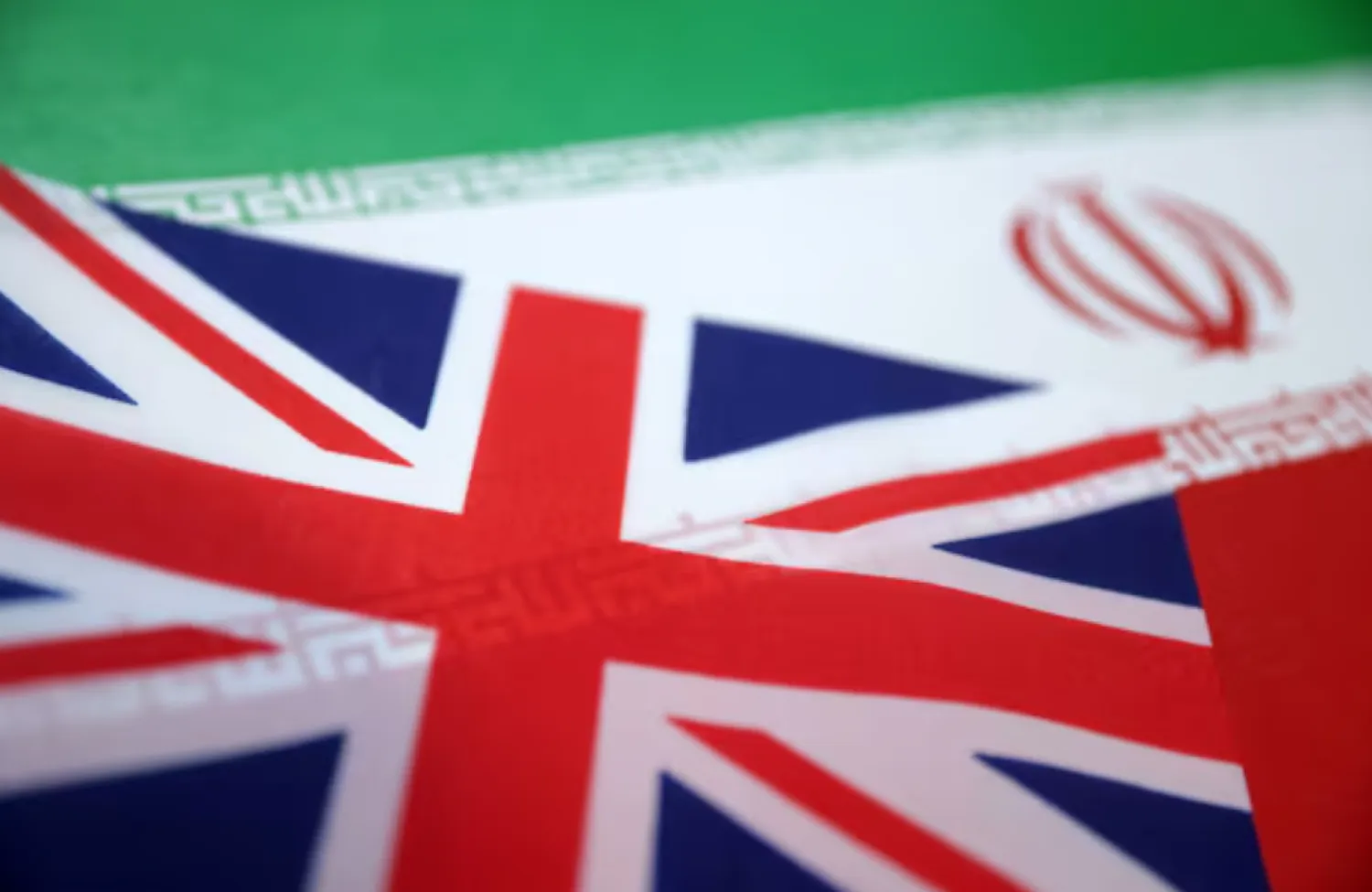 UK and Iran flags are seen in this illustration taken June 18, 2025. REUTERS/Dado Ruvic/Illustration 
