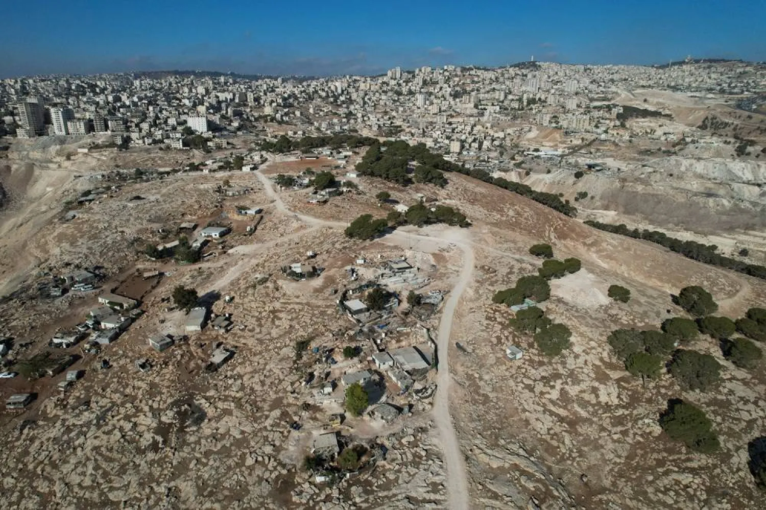  A drone view shows the area planned to be developed for the E1 settlement, which will displace several Bedouin communities, in Jabal Al-Baba, in the Israeli-occupied West Bank, September 17, 2025. (Reuters)