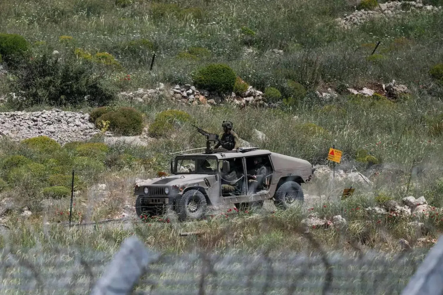 An Israeli military vehicle is seen near the border between the occupied Golan Heights and Syria, May 4, 2025 [Shir Torem/Reuters] 