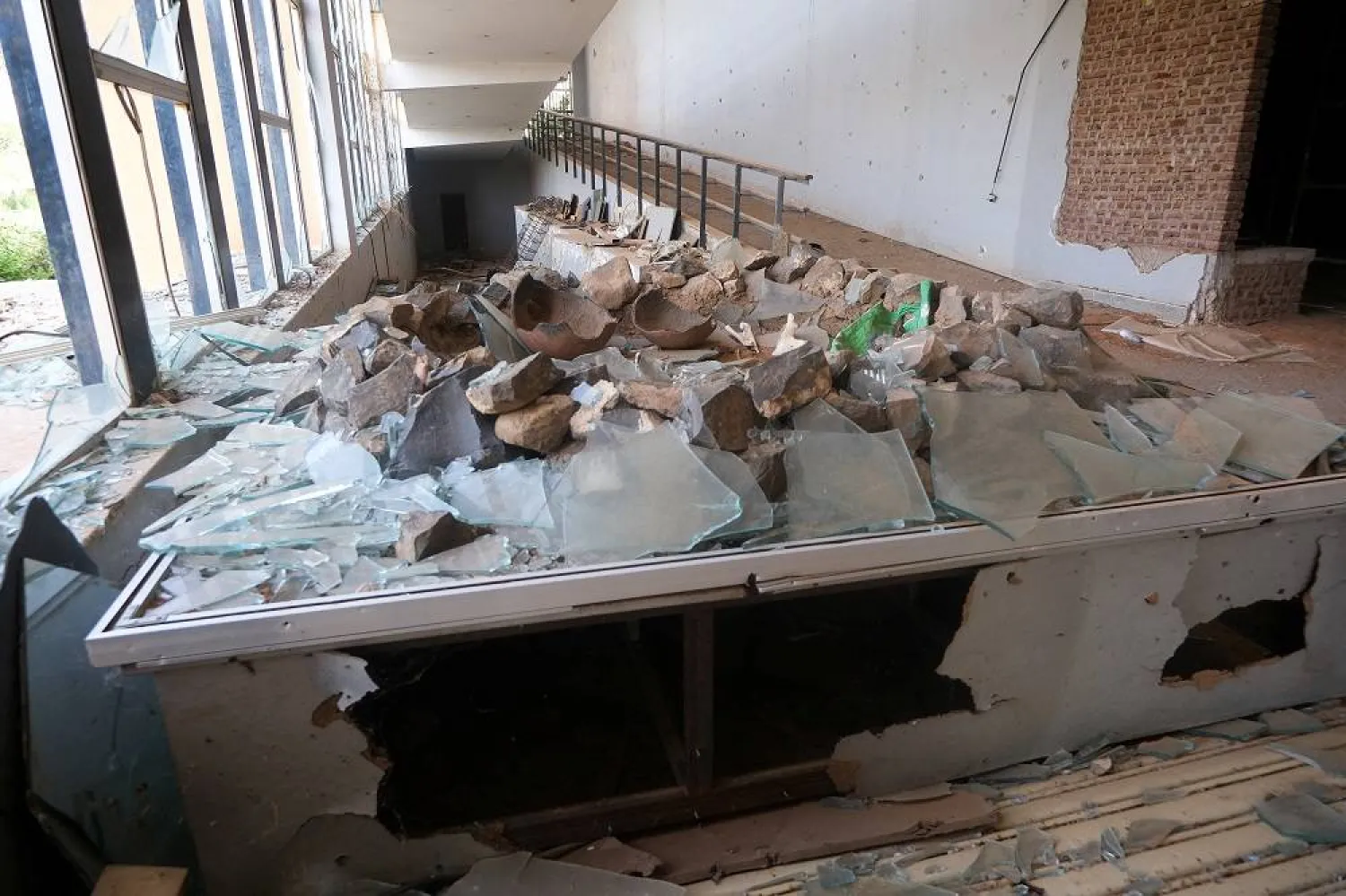A view shows damaged ancient pottery scattered across the grounds of the Sudan National Museum, which suffered extensive destruction and looting amid the ongoing conflict between the paramilitary Rapid Support Forces (RSF) and the Sudanese army, in Khartoum, Sudan, September 25, 2025. (Reuters)