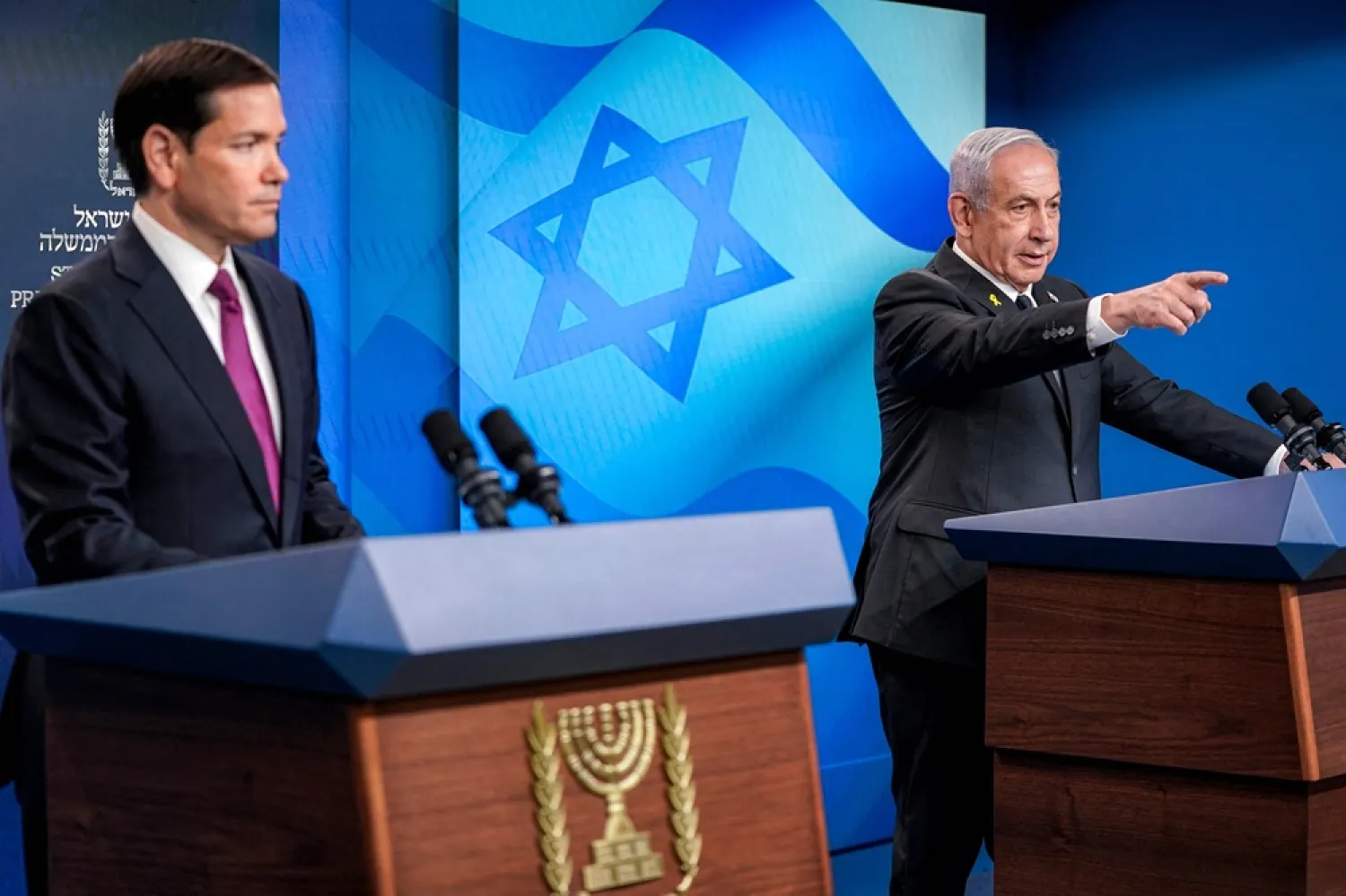 US Secretary of State Marco Rubio (L) looks on as Israel's Prime Minister Benjamin Netanyahu (R) takes a question during a joint press conference at the Prime Minister's Office in Jerusalem on September 15, 2025. (AFP) 
