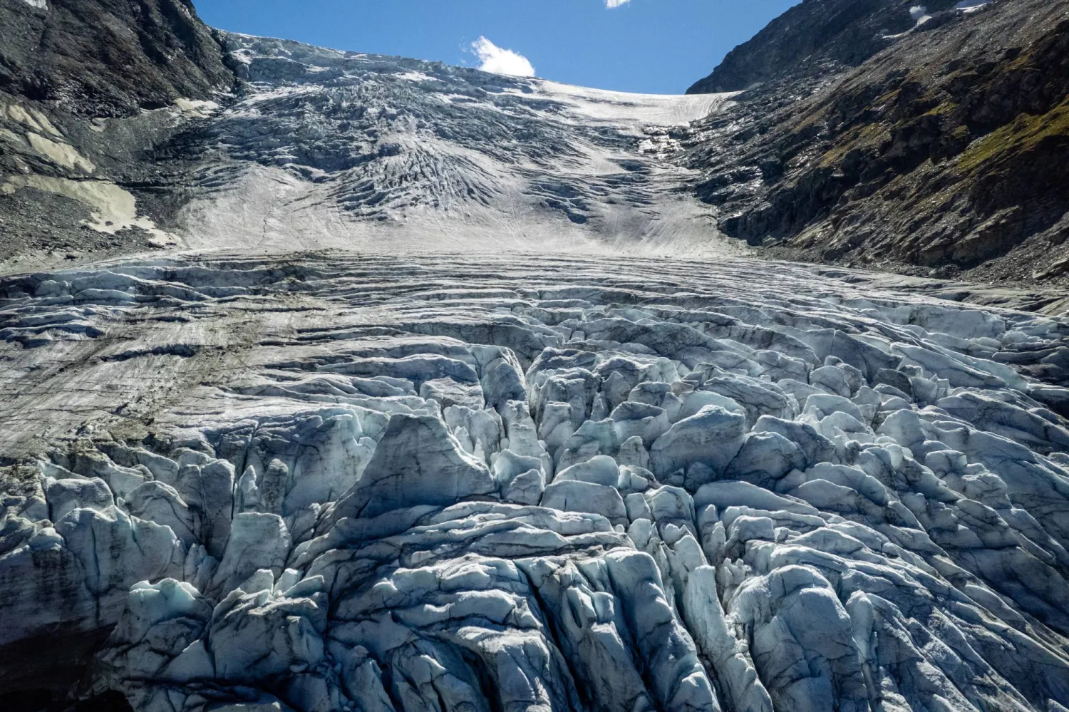 A drone view shows the Turtmann glacier on a warm summer day, amid climate change, in Turtmann, Switzerland, September 3, 2025. REUTERS/Denis Balibouse