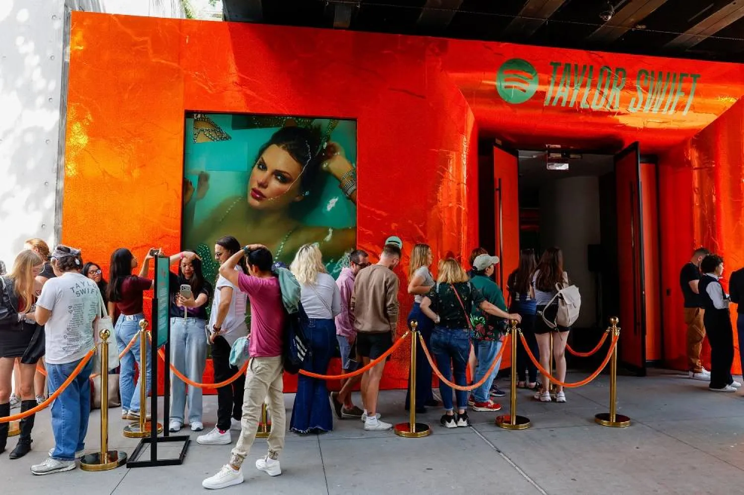 People wait to enter a Spotify pop-up event for Taylor Swift’s album "The Life of a Showgirl" in New York City, US, September 30, 2025. (Reuters)