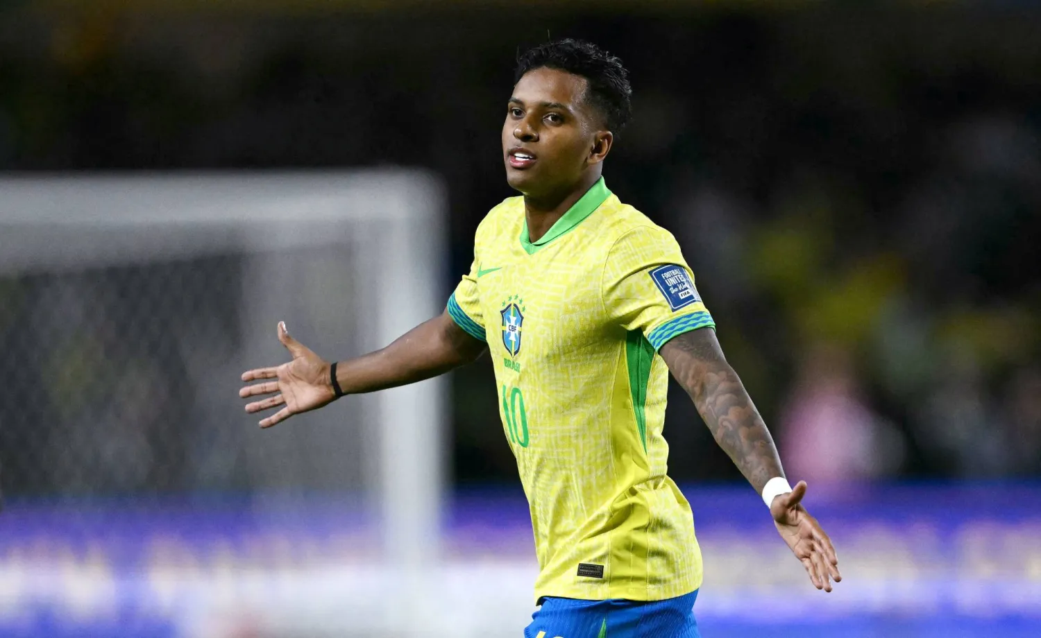 (FILES) Brazil's forward Rodrygo celebrates after scoring during the 2026 FIFA World Cup South American qualifiers football match between Brazil and Ecuador, at the Major Antônio Couto Pereira stadium in Curitiba, Brazil, on September 6, 2024. (Photo by Mauro PIMENTEL / AFP)