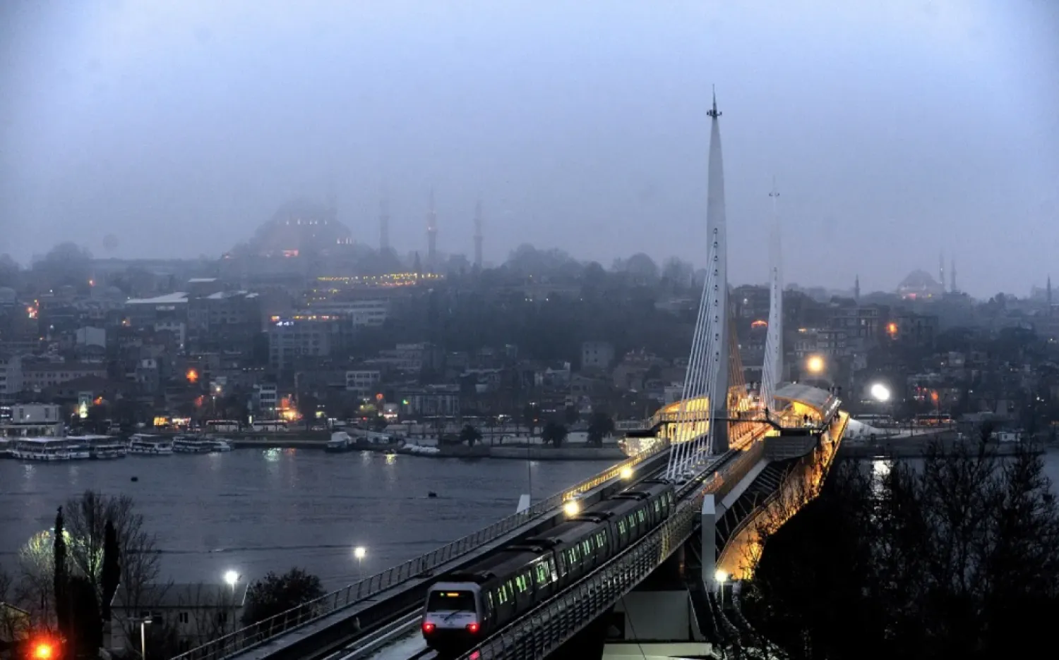 A metro train crosses the Istanbul's Golden Horn. (AFP)