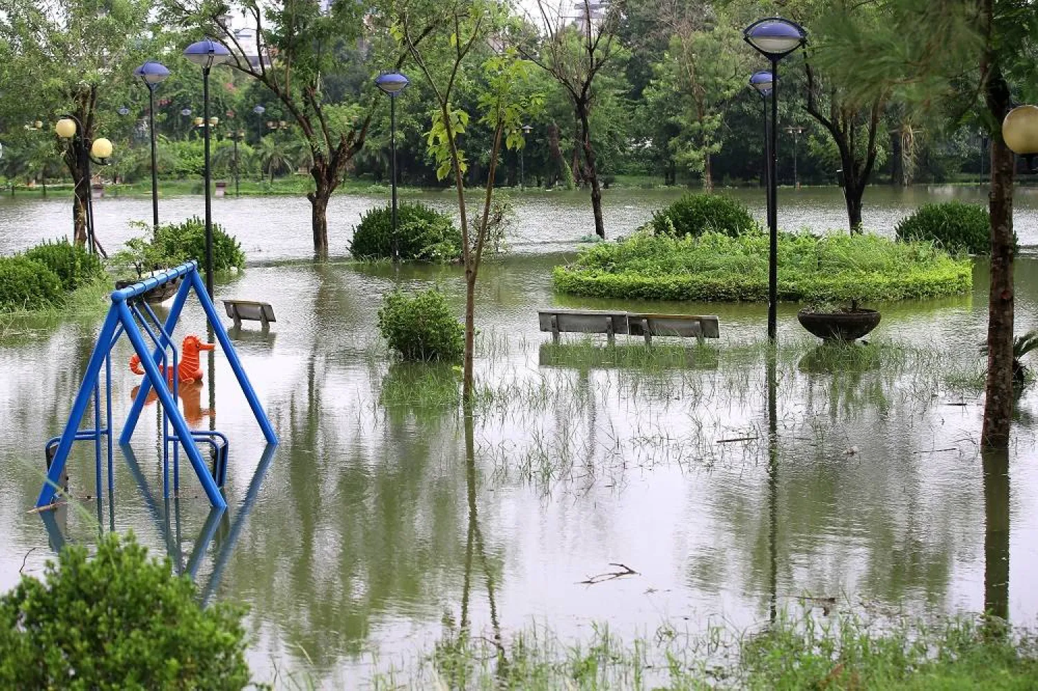A playground amidst the flood waters, in Hanoi, Vietnam, 01 October 2025. (EPA) 