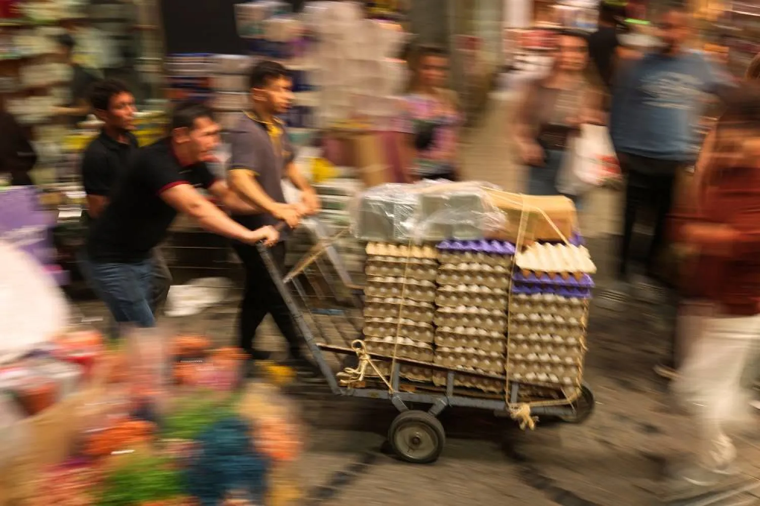 Workers deliver crates of eggs to a food shop at Eminonu commercial district, in Istanbul, Friday, Sept. 26, 2025. (AP) 