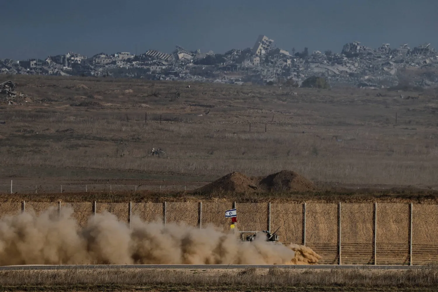 An Israeli armored personnel carrier (APC) maneuvers on Israeli side of the Israel-Gaza border, in Israel, October 3, 2025. (Reuters)