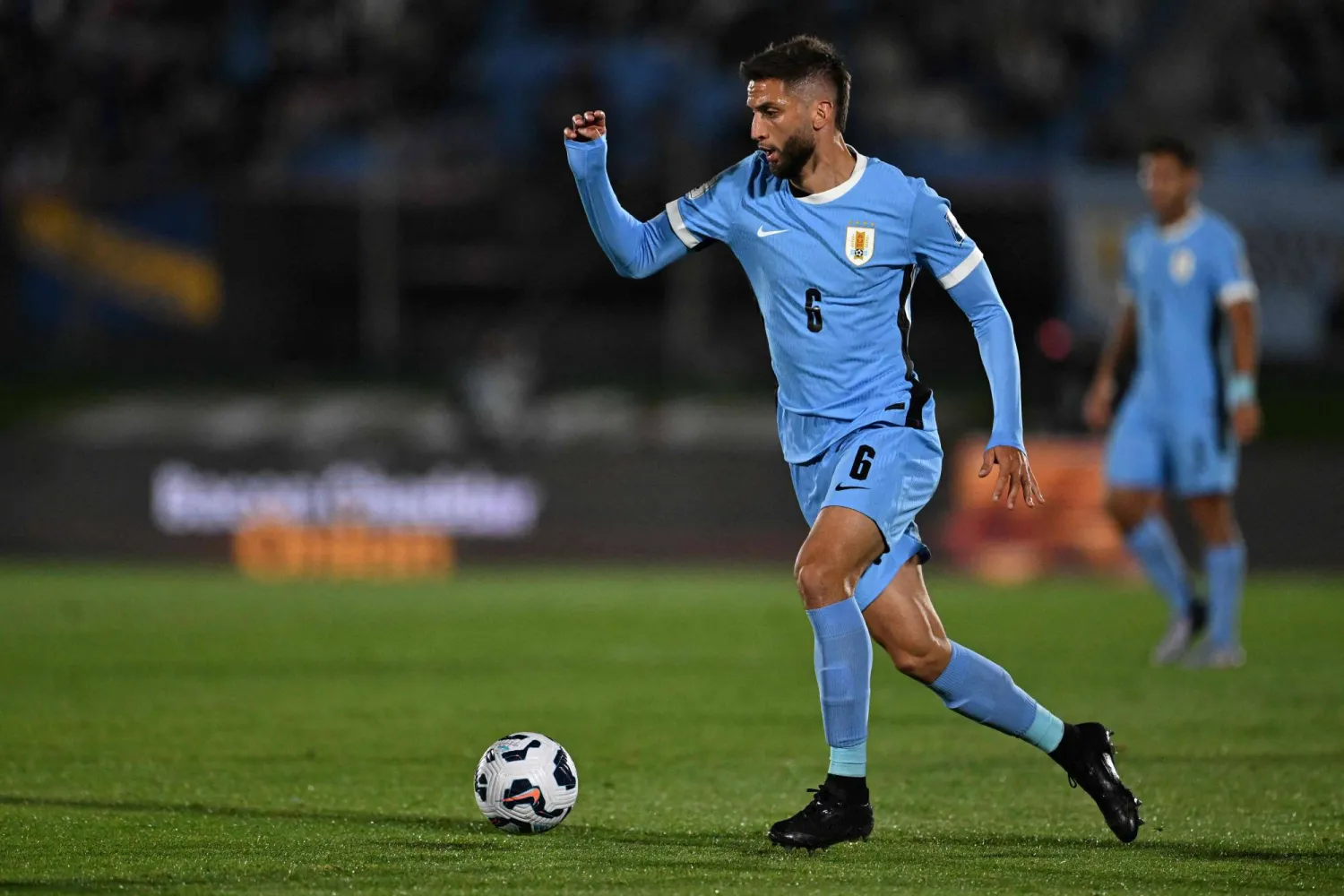 رودريغو بينتانكور باق مع توتنهام (أ.ف.ب)