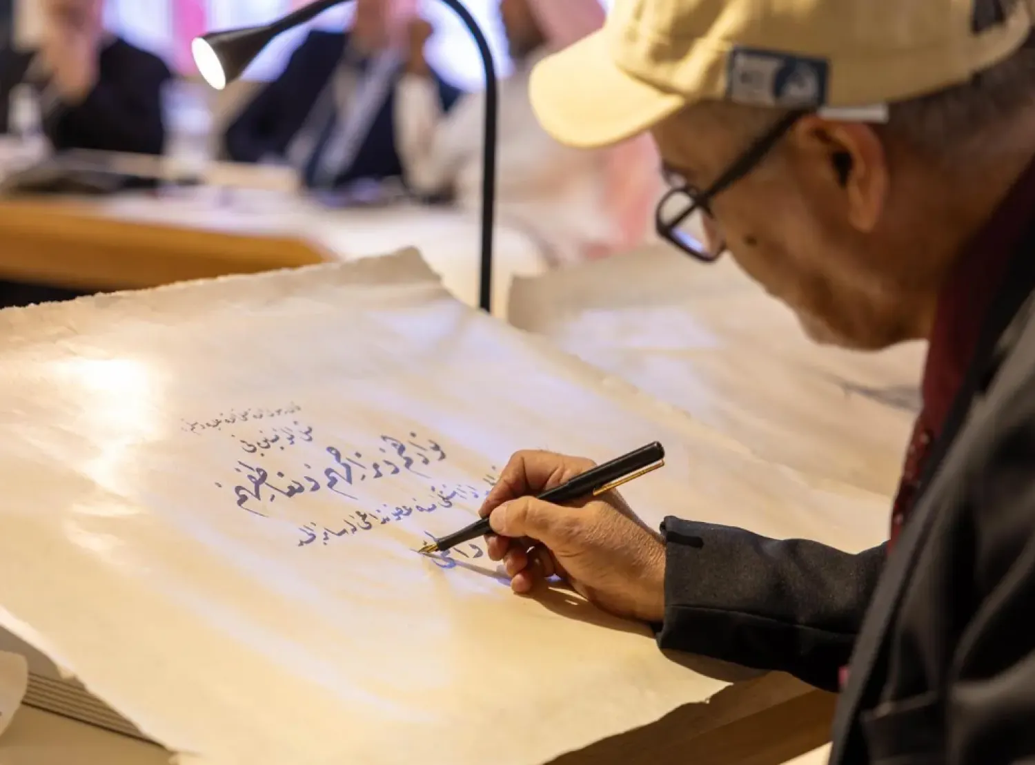 Nine calligraphers representing seven countries are participating, with their works to be evaluated by a specialized jury - SPA