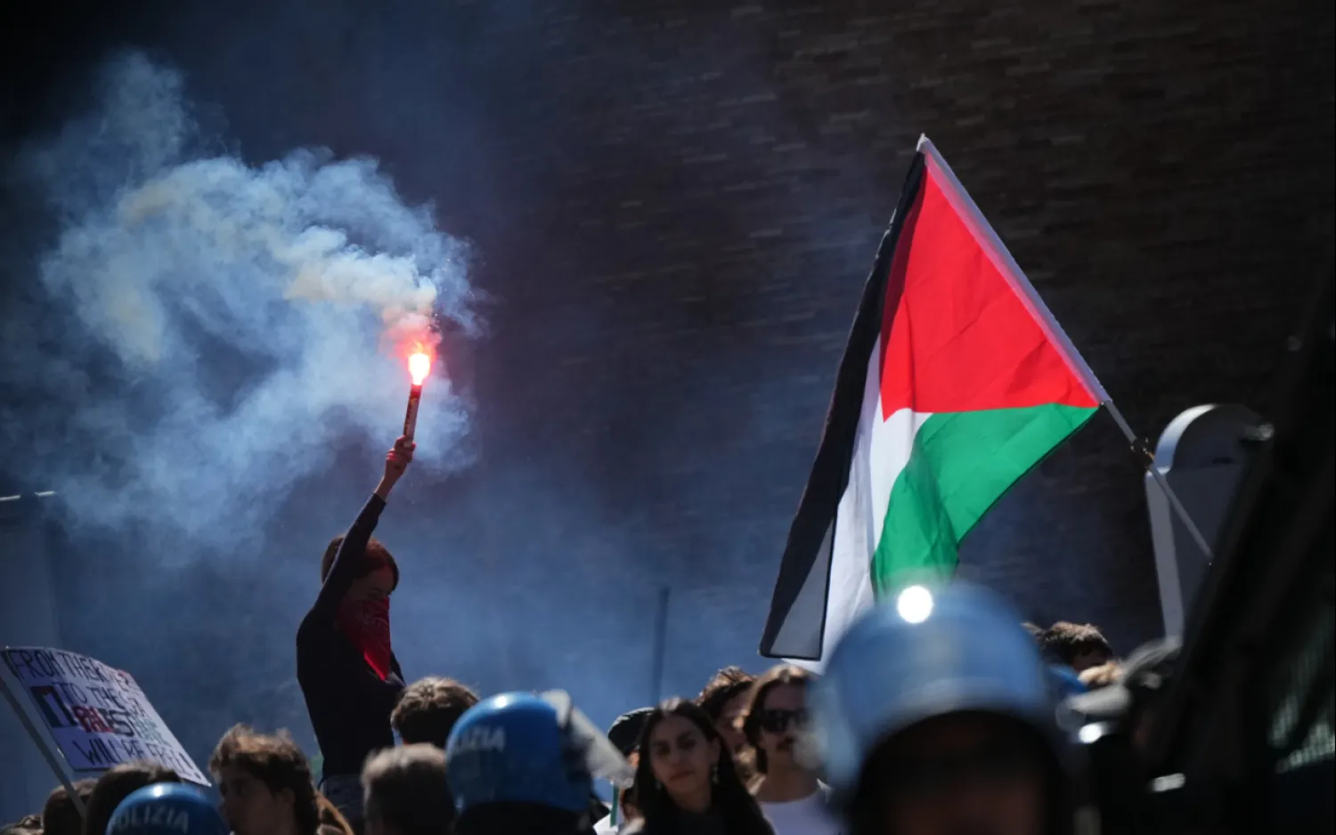 Pro-Palestinian demonstrators gather for a national general strike called by different unions to protest against the situation in Gaza two days after Israeli forces intercepted a Gaza-bound aid flotilla in the Mediterranean Sea, in Rome, Friday, Oct. 3, 2025. (AP Photo/Alessandra Tarantino)