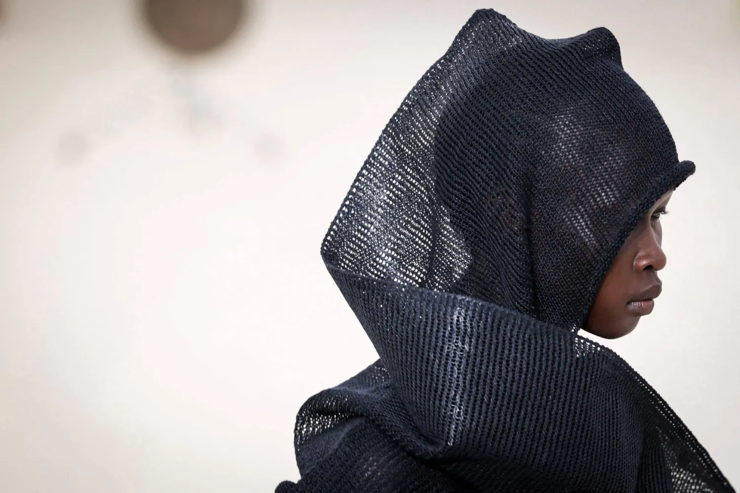 A model presents a creation by Issey Miyake for the Women Ready-to-wear Spring-Summer 2026 collection as part of the Paris Fashion Week, in Paris on October 3, 2025. (AFP)