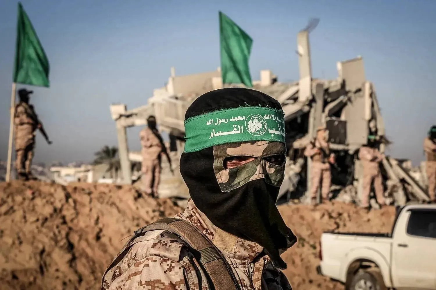 A Feb. 8, 2025 photo shows fighters from Hamas’ armed wing, the Ezzeddine al-Qassam Brigades, in Deir al-Balah, central Gaza Strip. (dpa) 