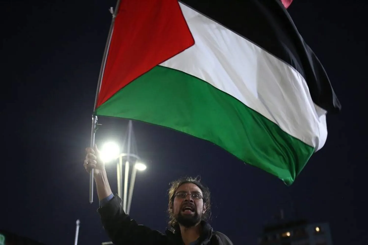 A person participates in a sit-in demanding the release of the crew members of the Global Sumud Flotilla in La Paz, Bolivia, 03 October 2025. (EPA)